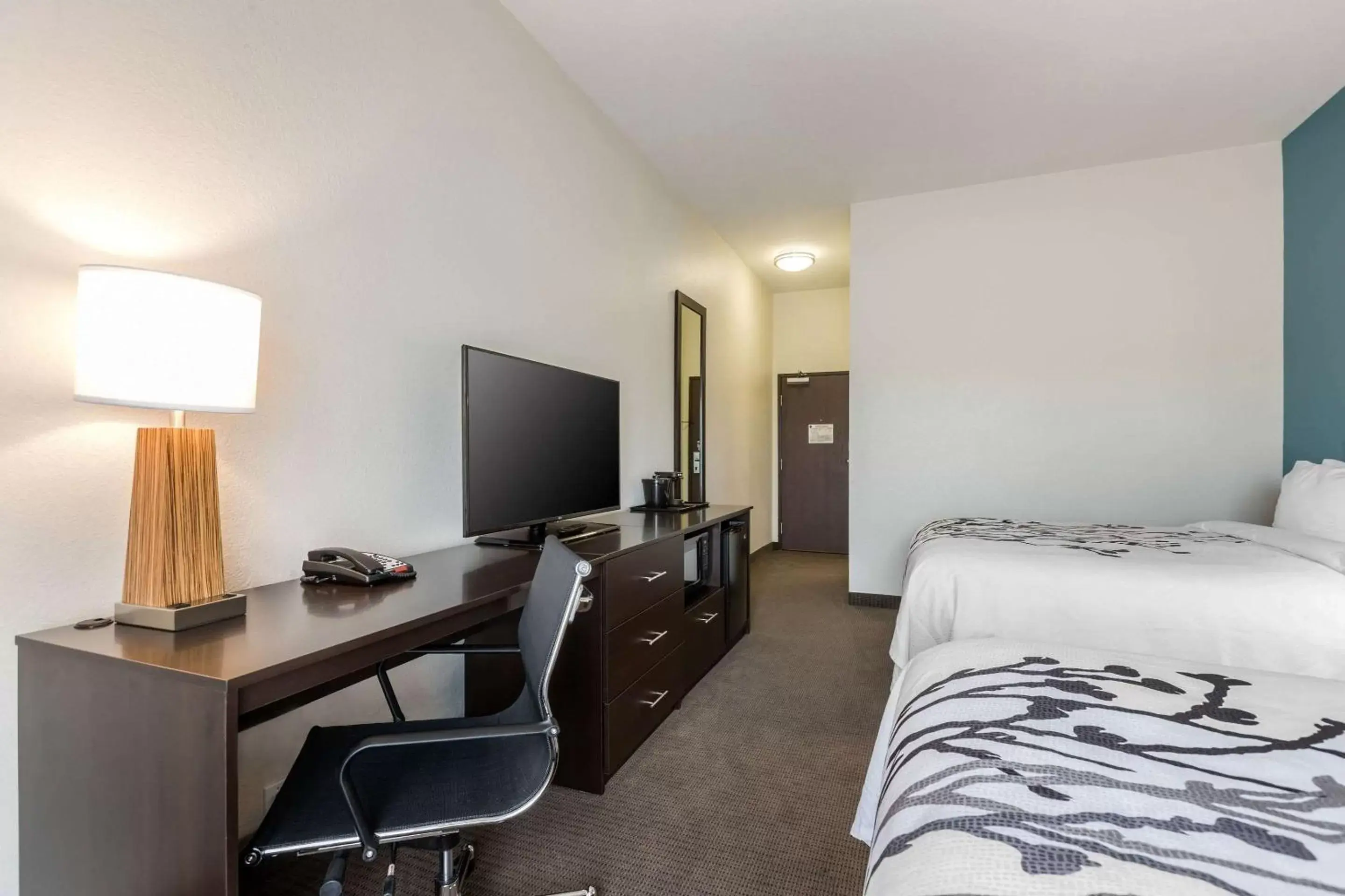 Photo of the whole room, TV/Entertainment Center in Sleep Inn & Suites West Des Moines near Jordan Creek