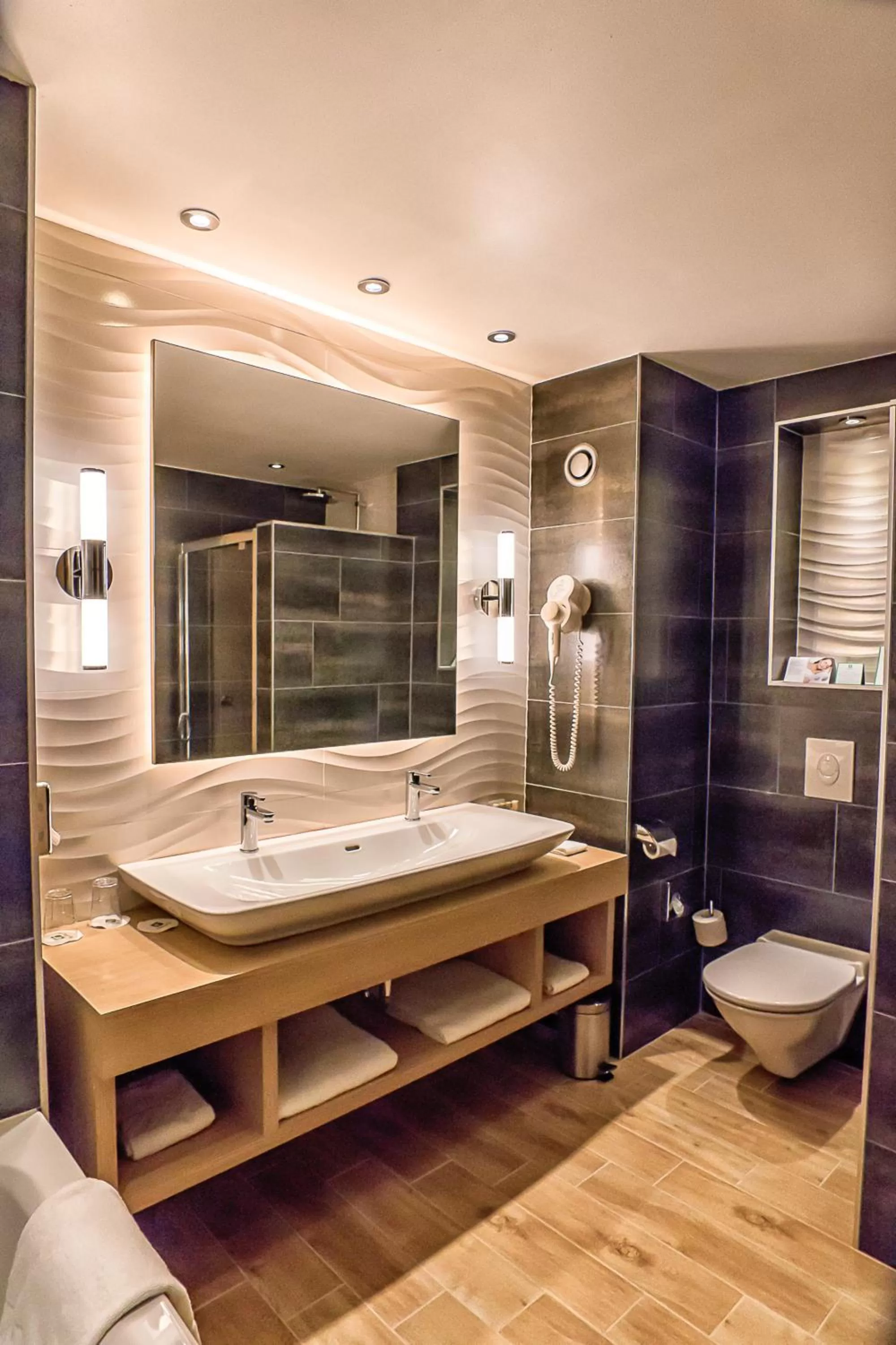 Bathroom in Holiday Inn Budapest-Budaörs by IHG