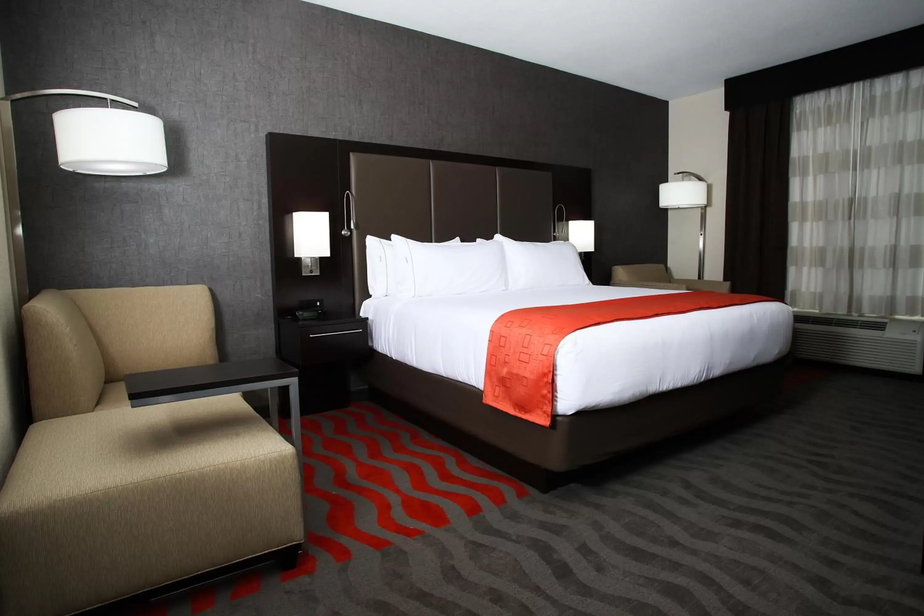 Bed in Holiday Inn Express & Suites Monroe, an IHG Hotel