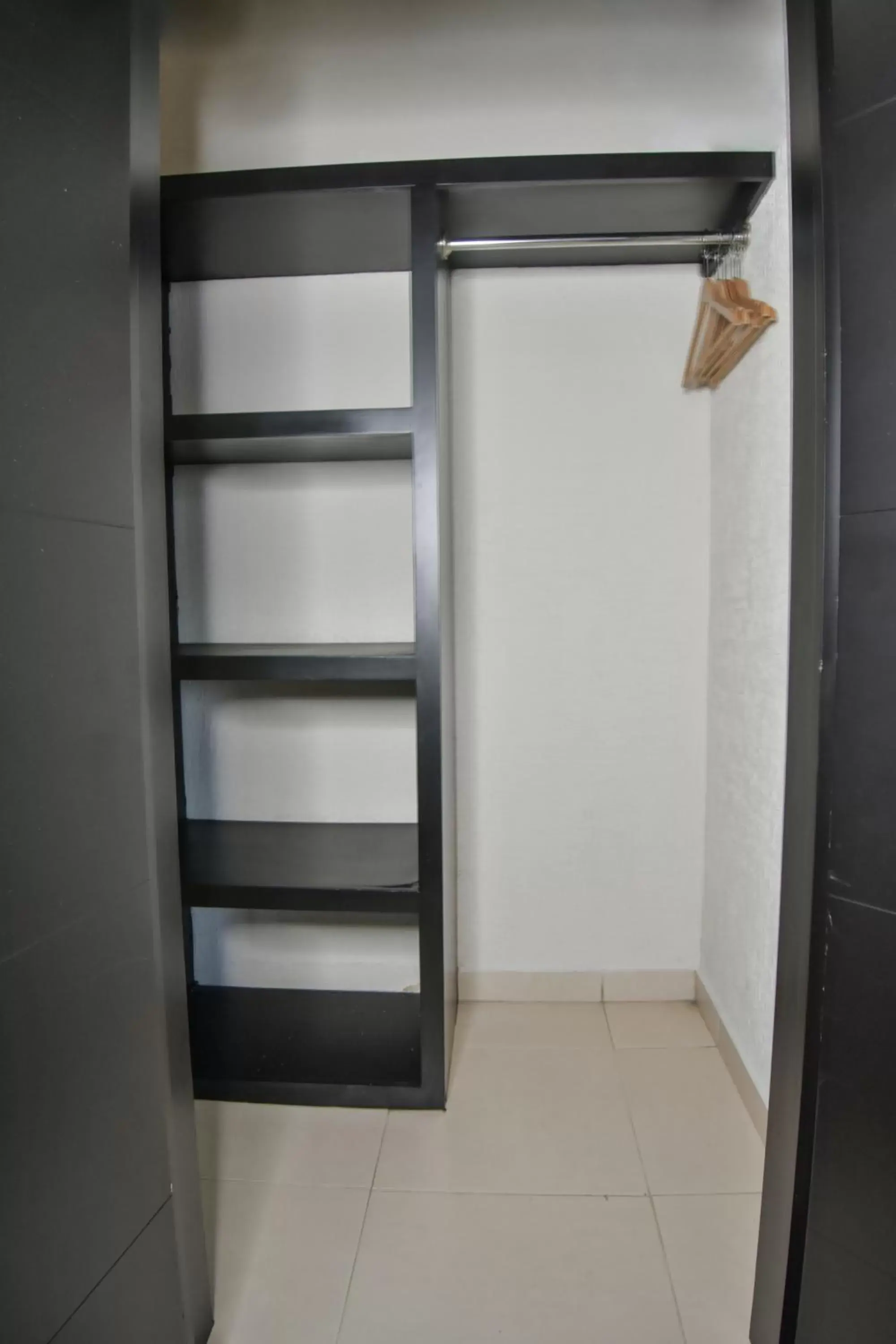 wardrobe in Hotel Portonovo Plaza Centro