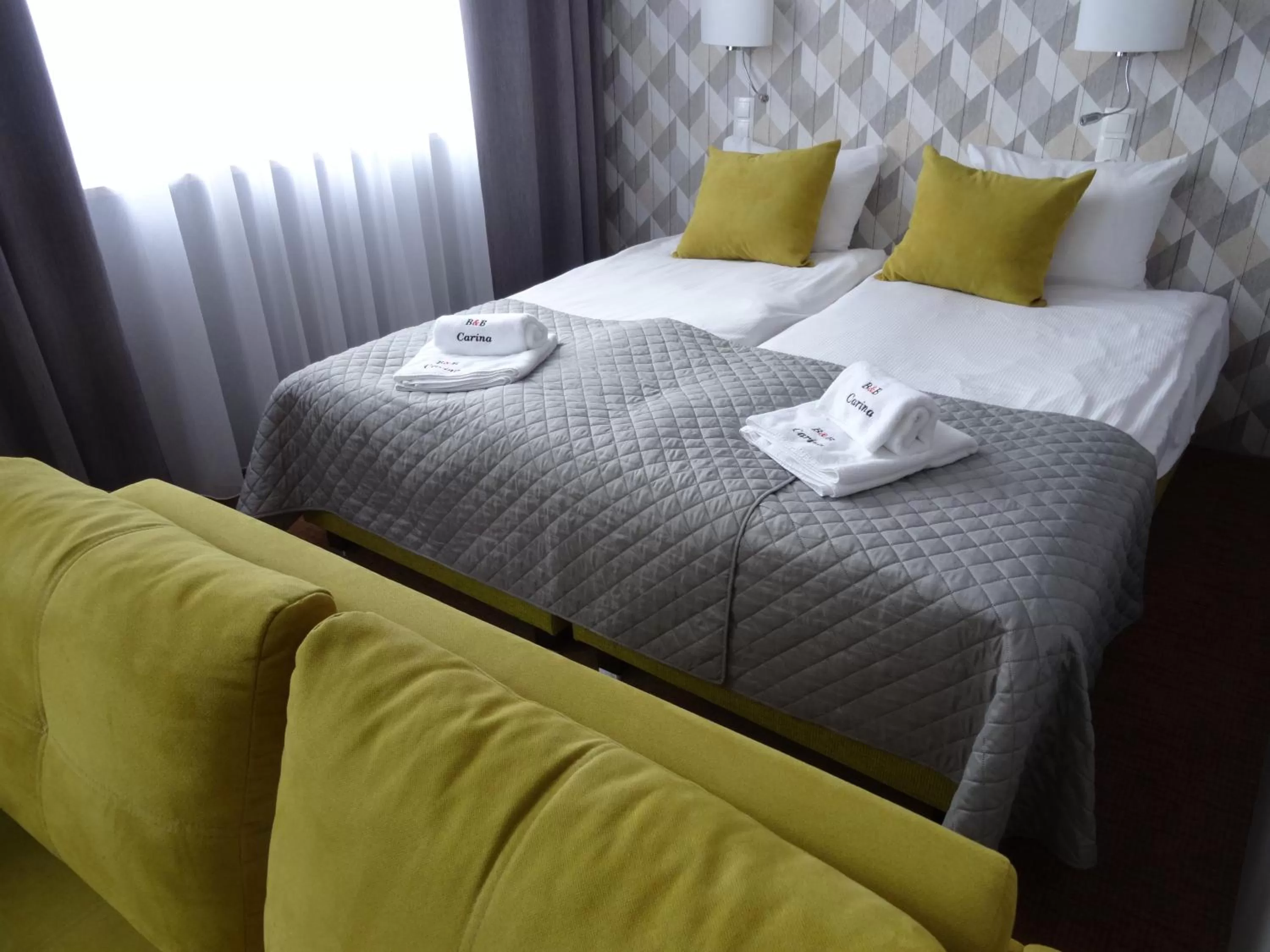 Photo of the whole room, Bed in Carina Hotel