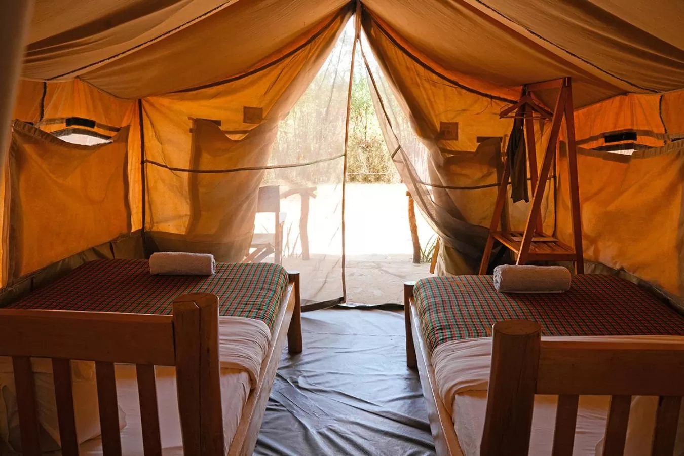 Bed in Kara-Tunga Safari Camp