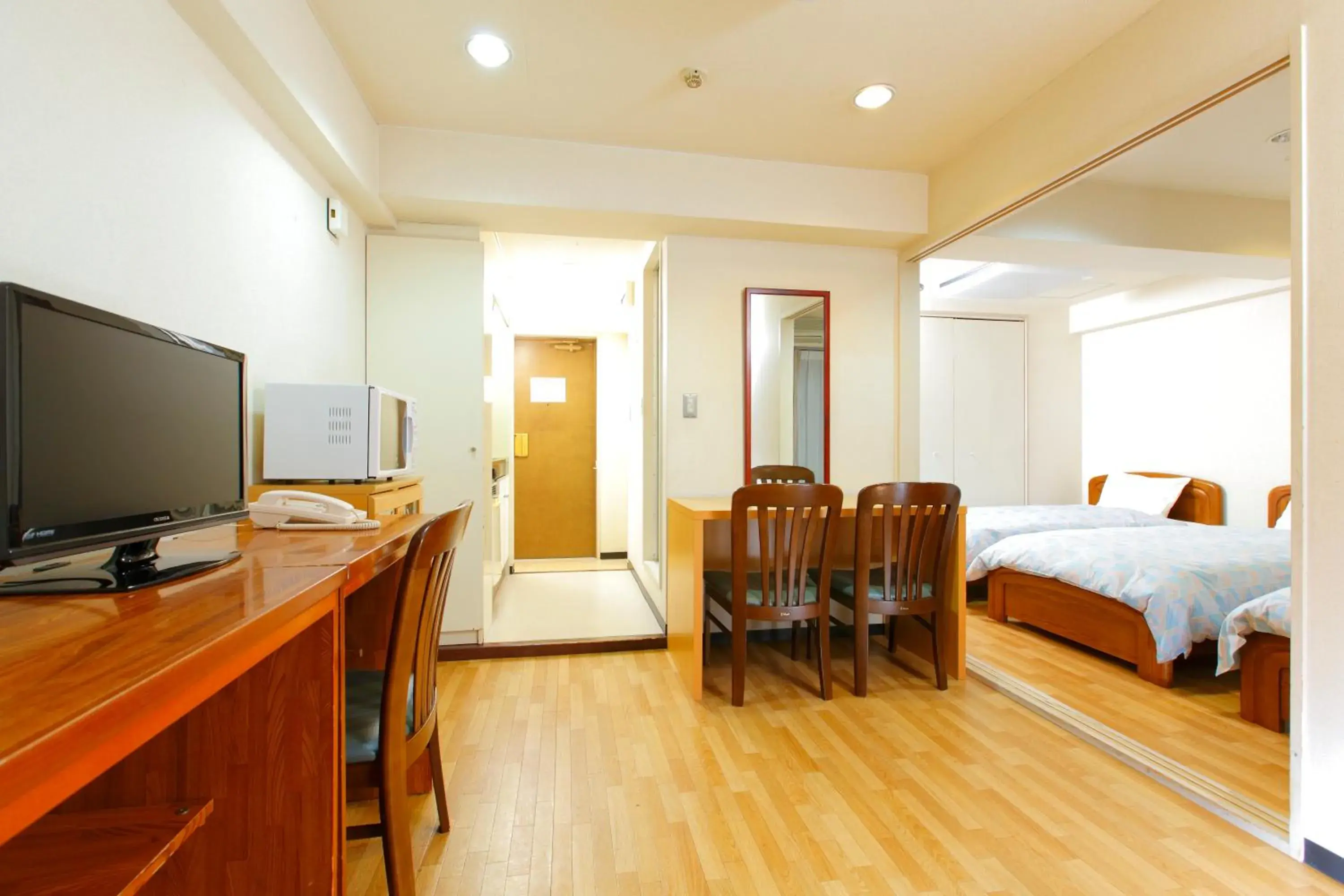 Photo of the whole room, TV/Entertainment Center in FLEXSTAY INN Tamagawa