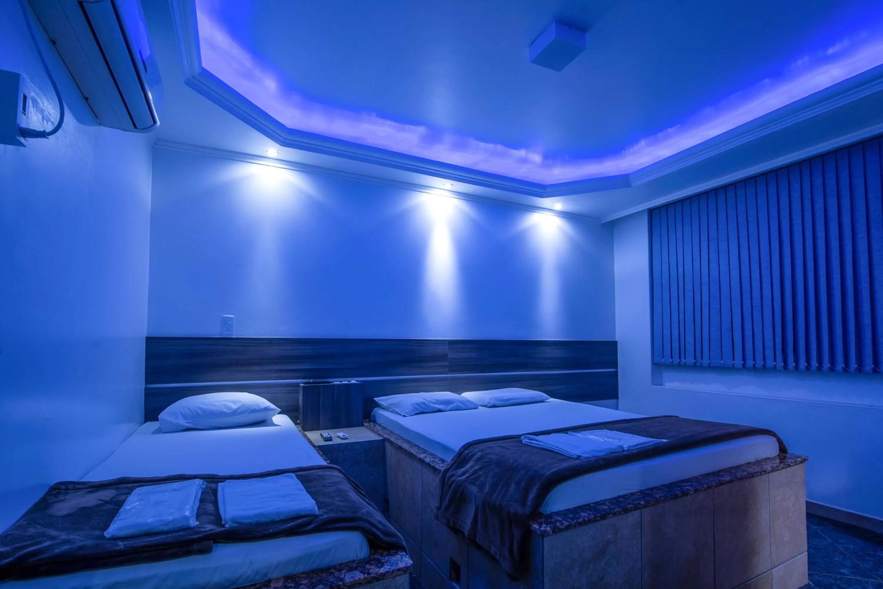 Bedroom in Classic Hotel e Motel