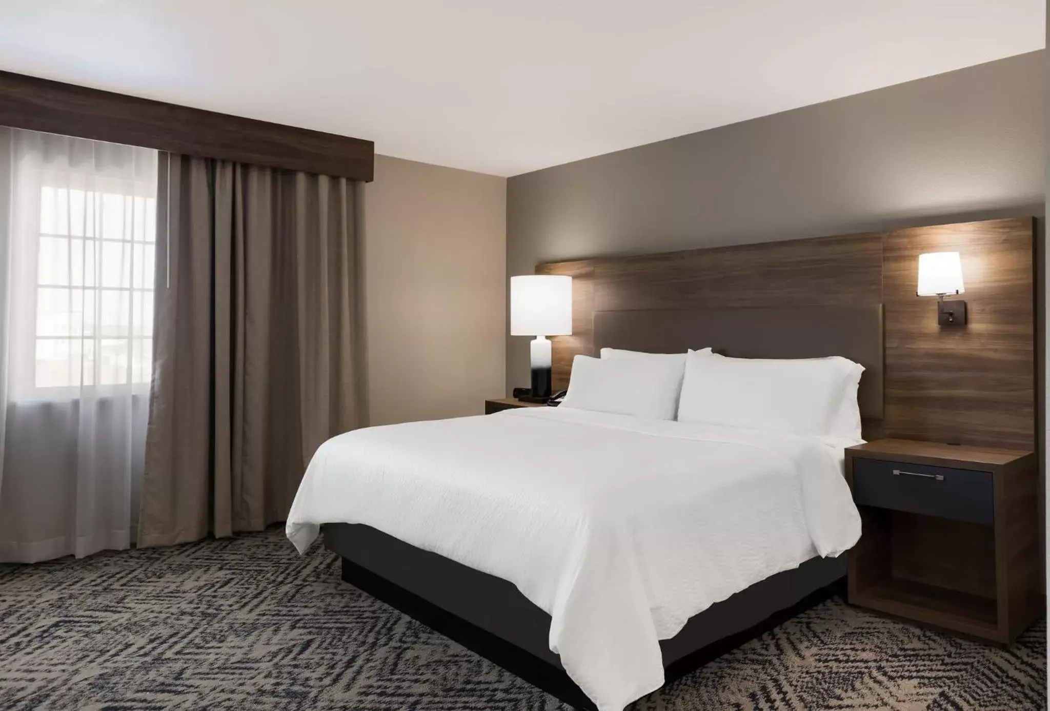 Photo of the whole room, Bed in Candlewood Suites Lafayette, an IHG Hotel