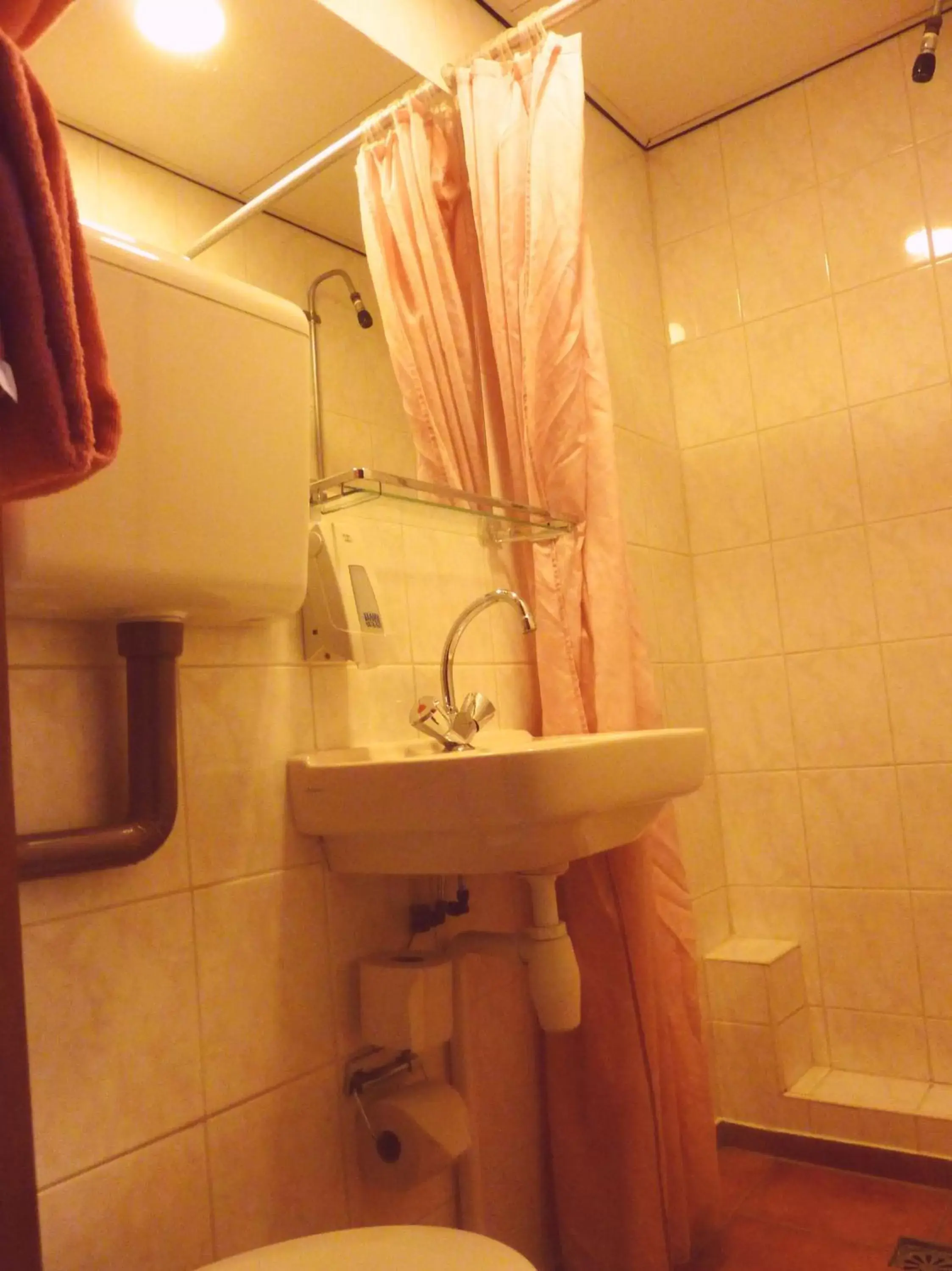Bathroom in Nadia Hotel
