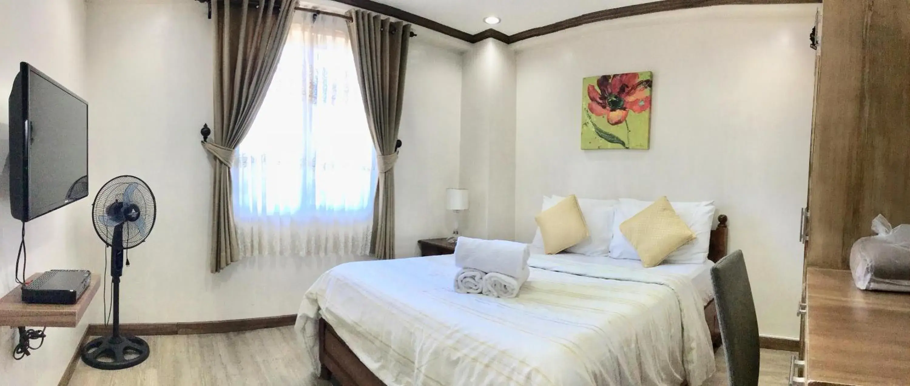 Bed in Prestige Vacation Apartments - Bonbel Condominium