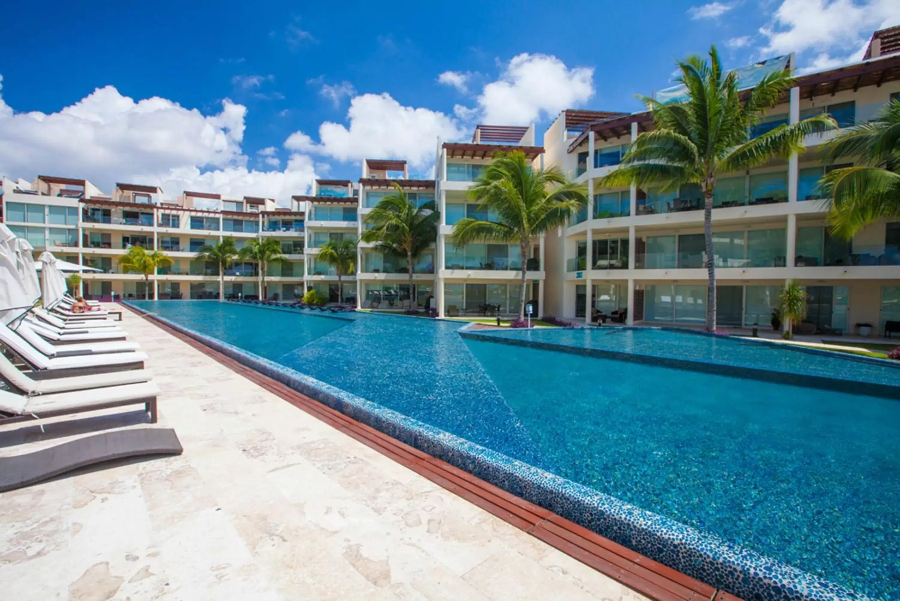 Swimming Pool in The Elements Oceanfront & Beachside Condo Hotel