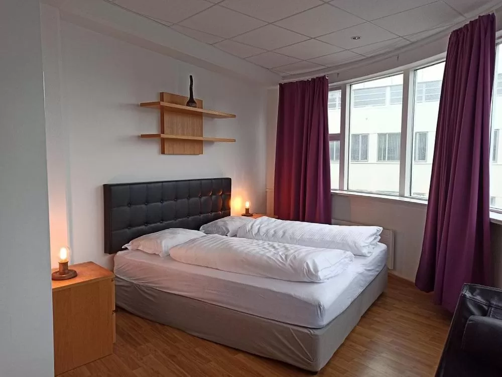 Bed in 101 Guesthouse Hotel