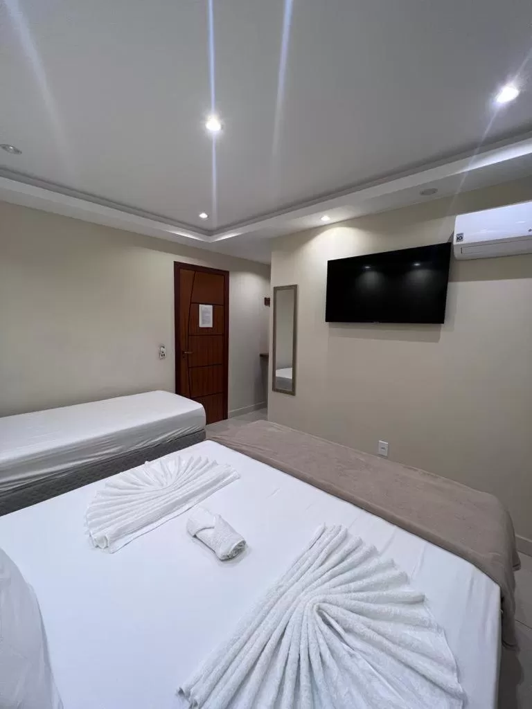 Bed in Pousada Arraial Tropical