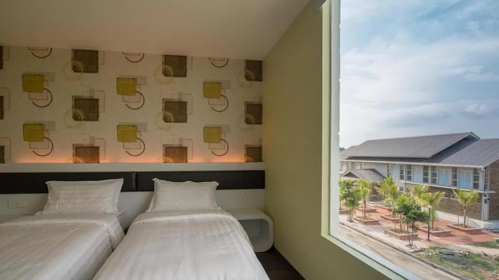 Bed in Riverfront Boutique Hotel