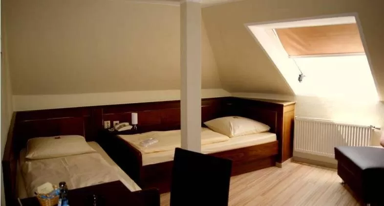 Bed in Hotel am Wilhelmsplatz