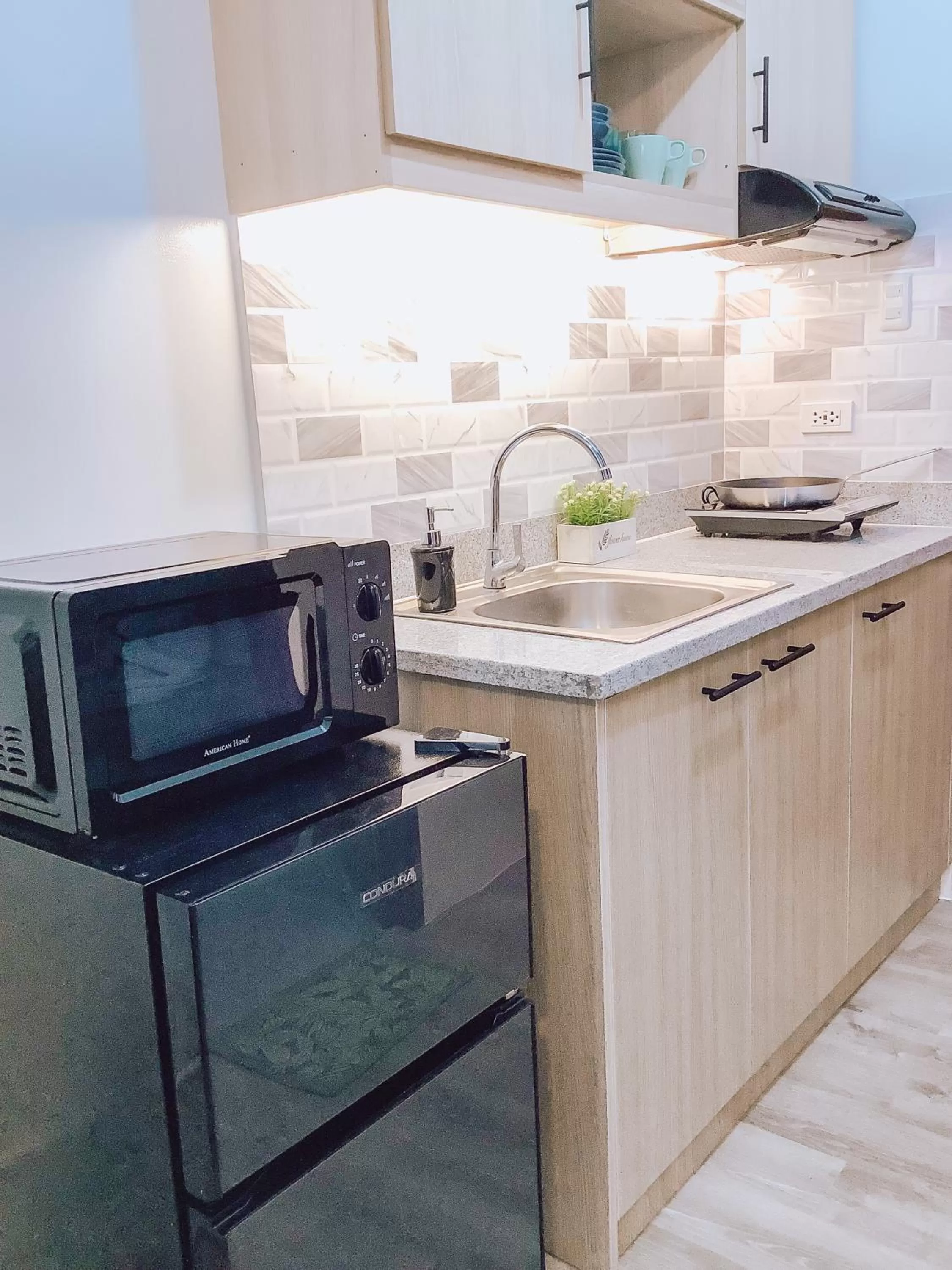 Kitchen or kitchenette in AZRA Bacolod at Mesavirre Garden Residences