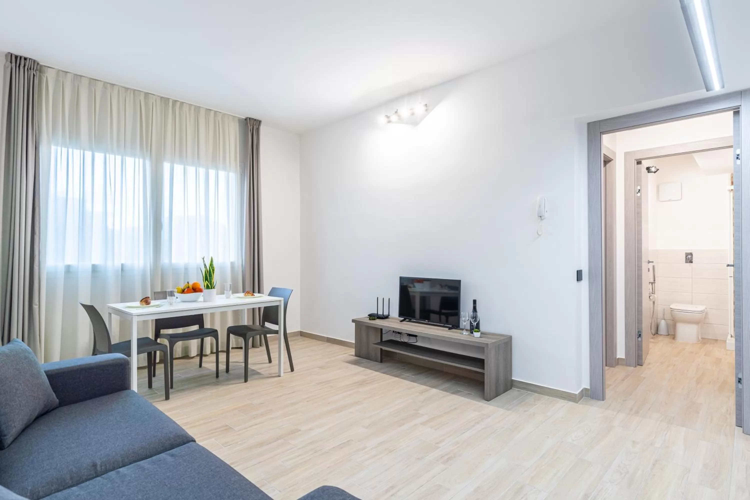 Communal lounge/ TV room in Solemar Sicilia - Multi Suite