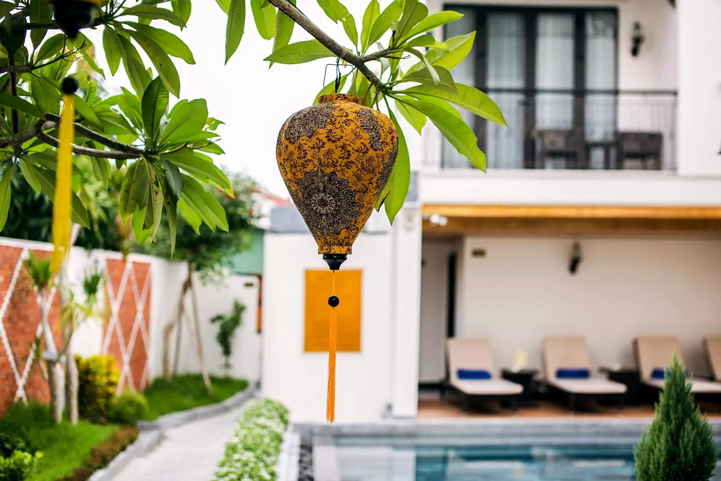 Swimming pool, Property Building in Laluna Hoi An Riverside Hotel & Spa