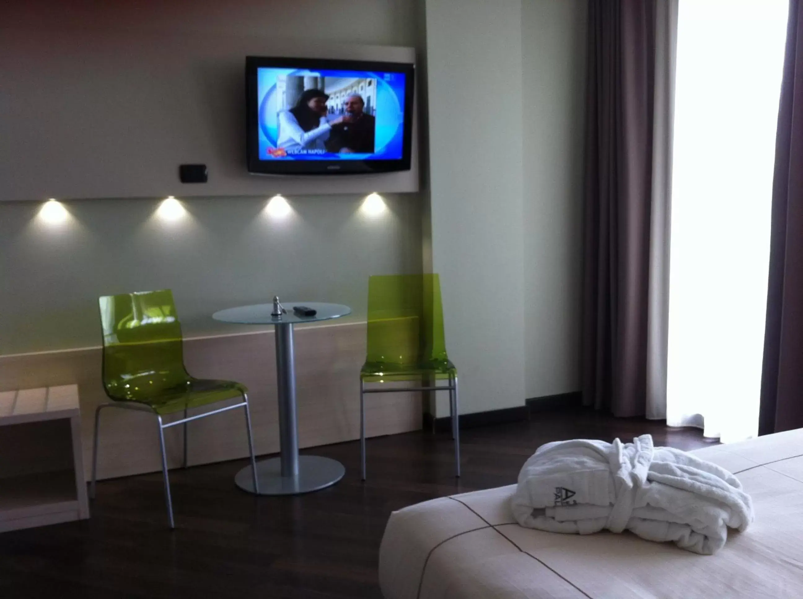 Photo of the whole room, TV/Entertainment Center in Acca Palace AA Hotels