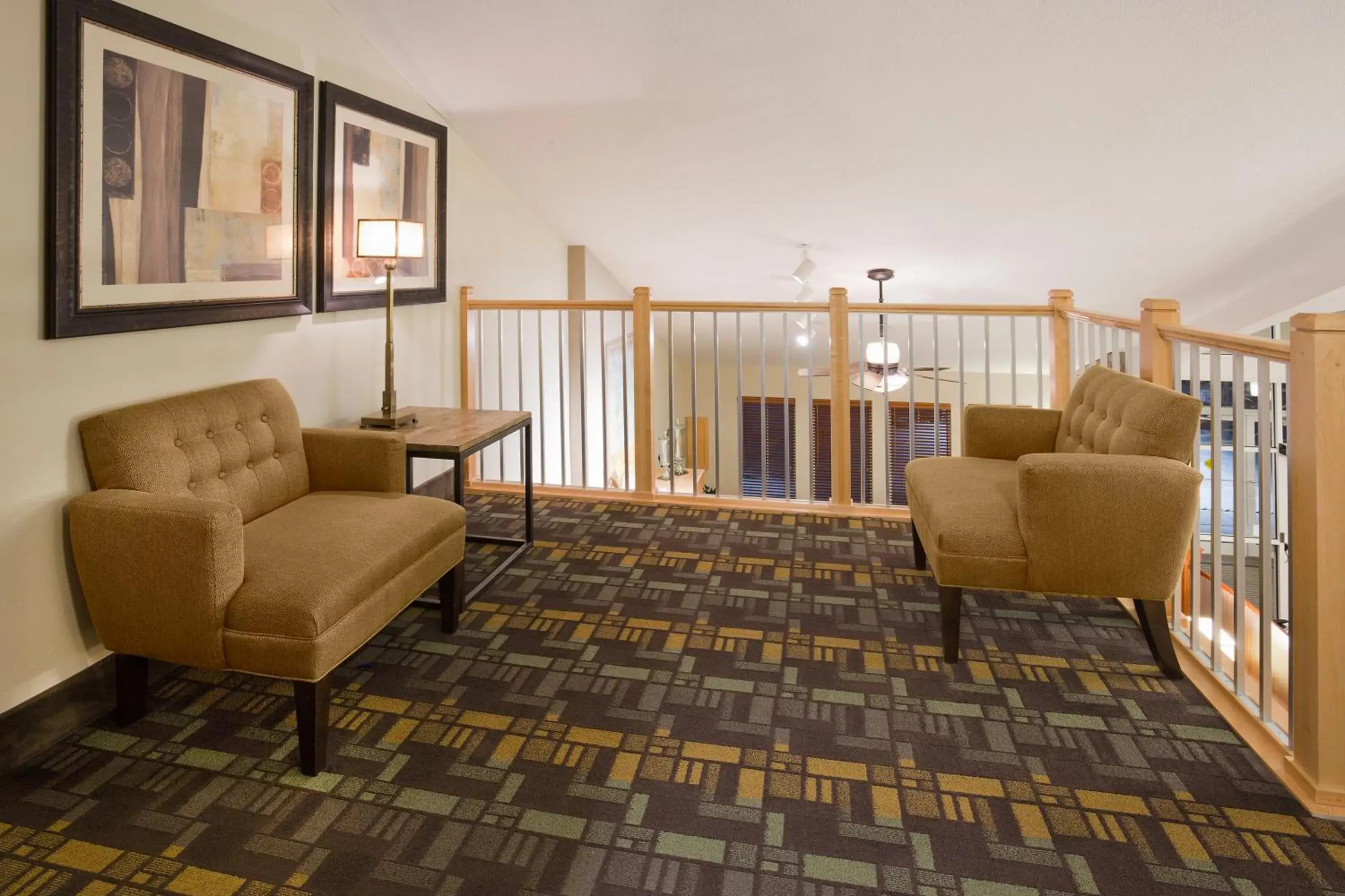 Lobby or reception, Seating Area in AmericInn by Wyndham Osage