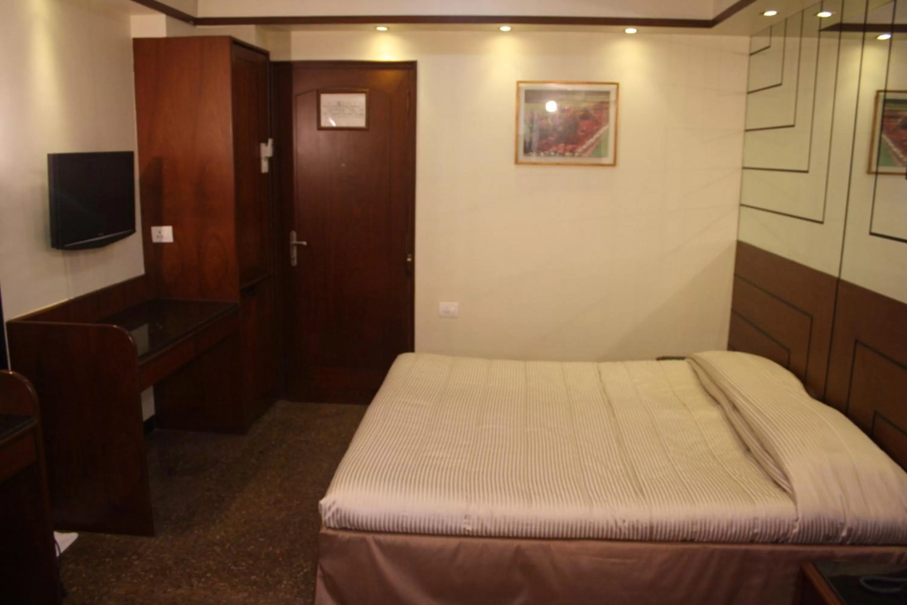 Photo of the whole room, Bed in Hotel Karl Residency