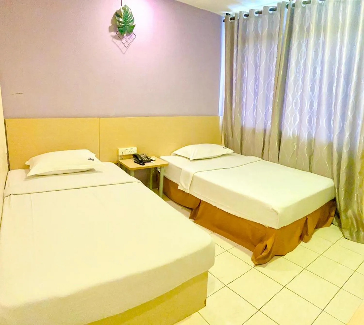 Bed in Sri Indar Hotel