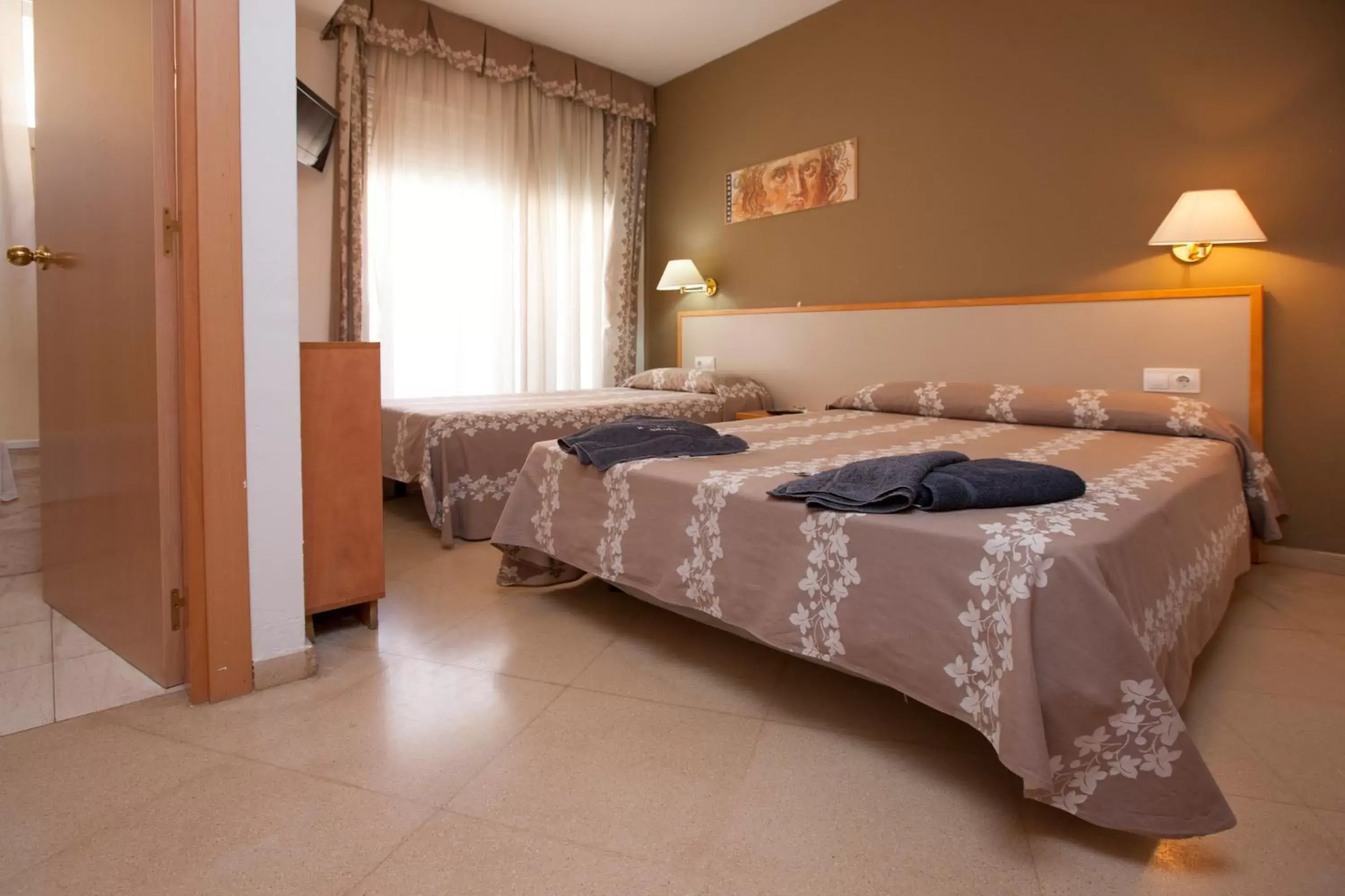 Bed in Hotel Cosmos Tarragona