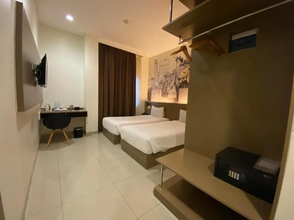 Bed in OPI INDAH Hotel