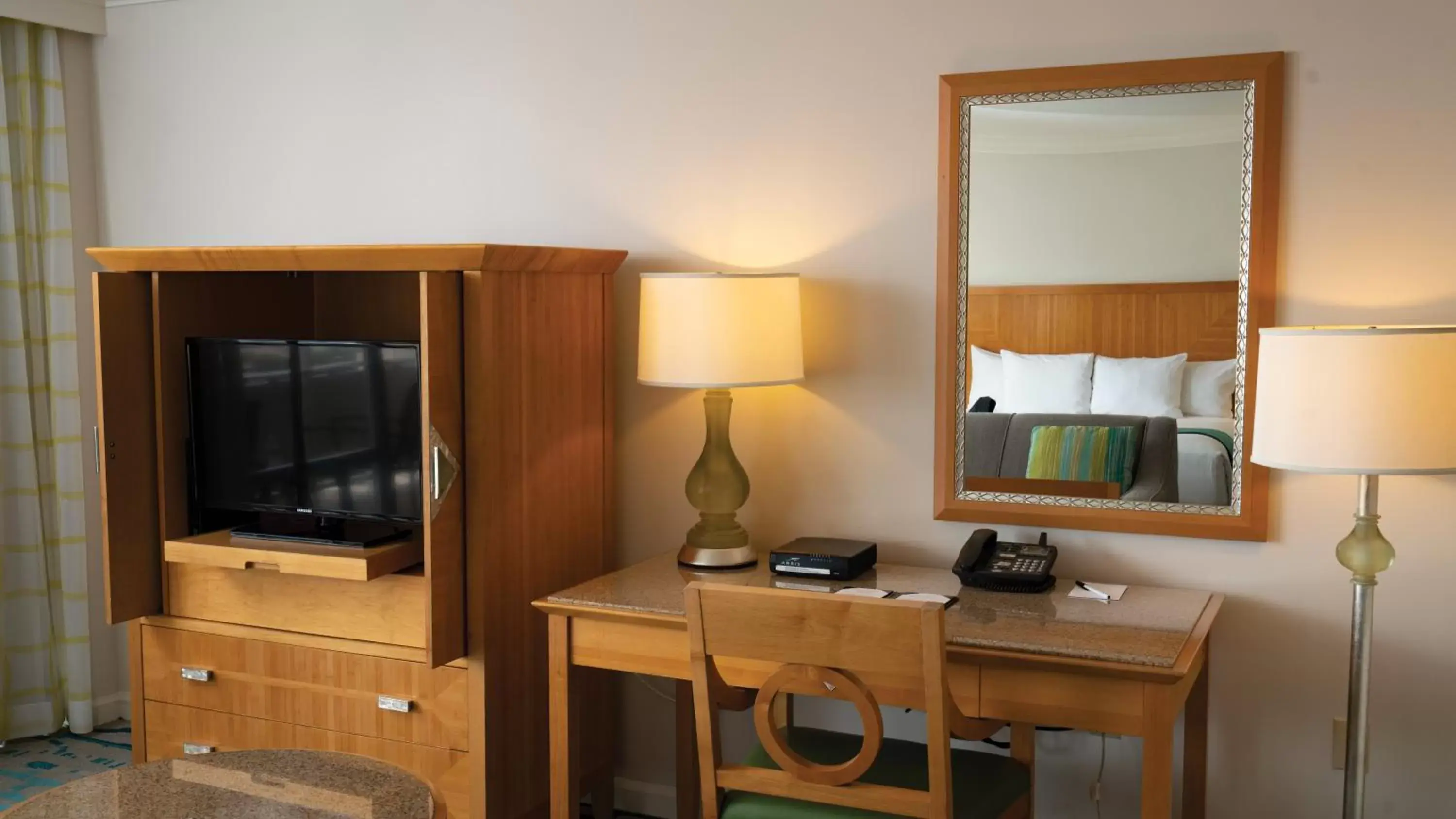 Bedroom, TV/Entertainment Center in Waikiki Marina Resort at the Ilikai