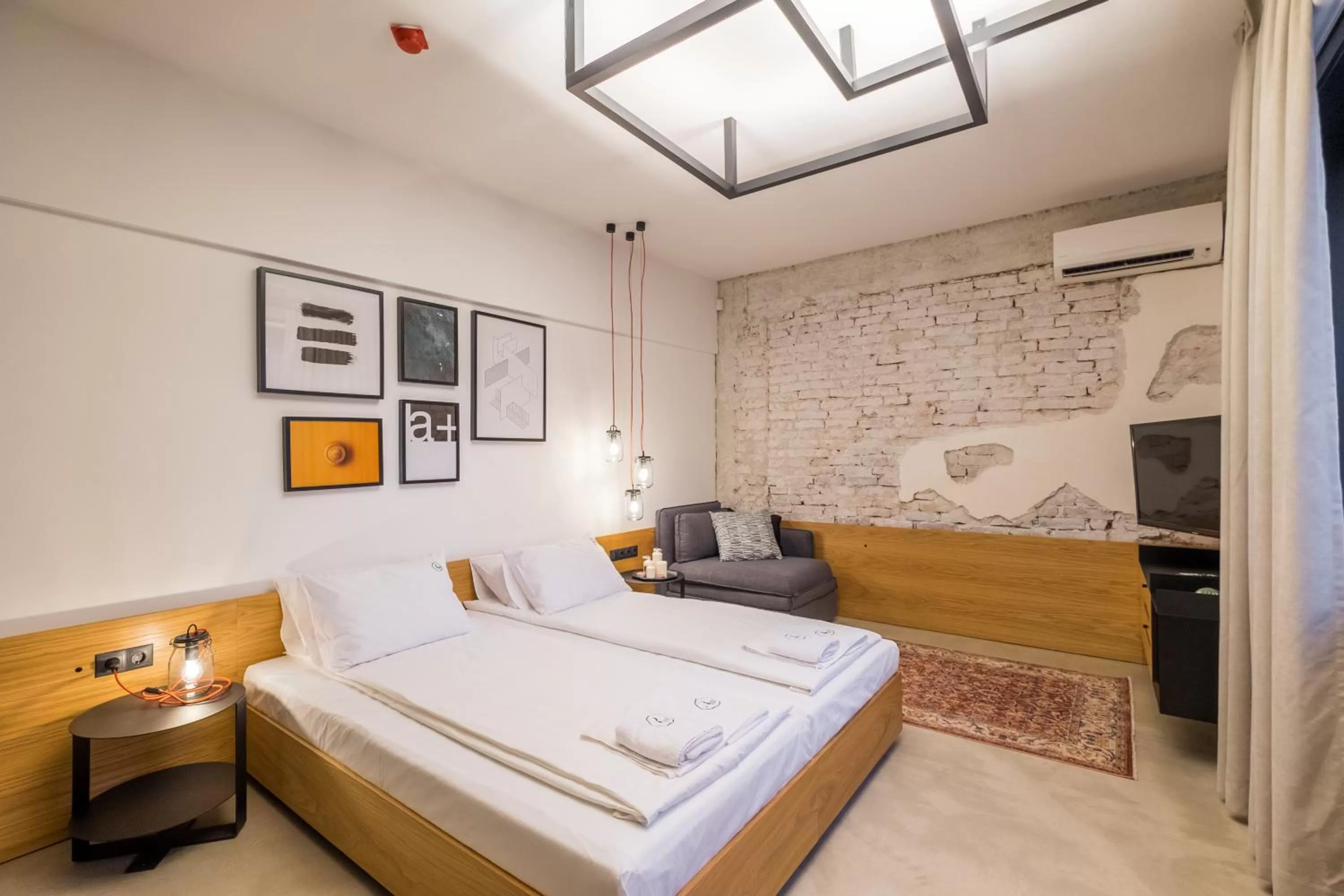 Bed in R34 Boutique Hotel