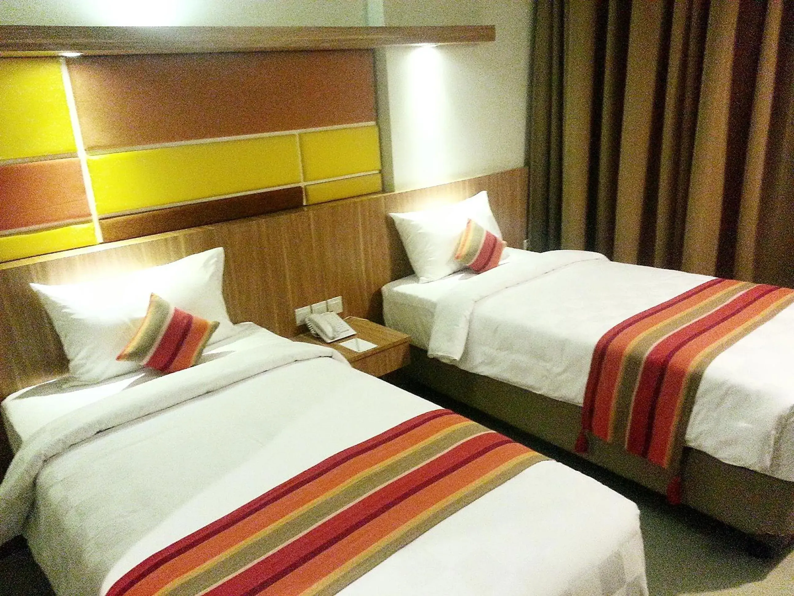 Bed in Puspamaya Airport Hotel