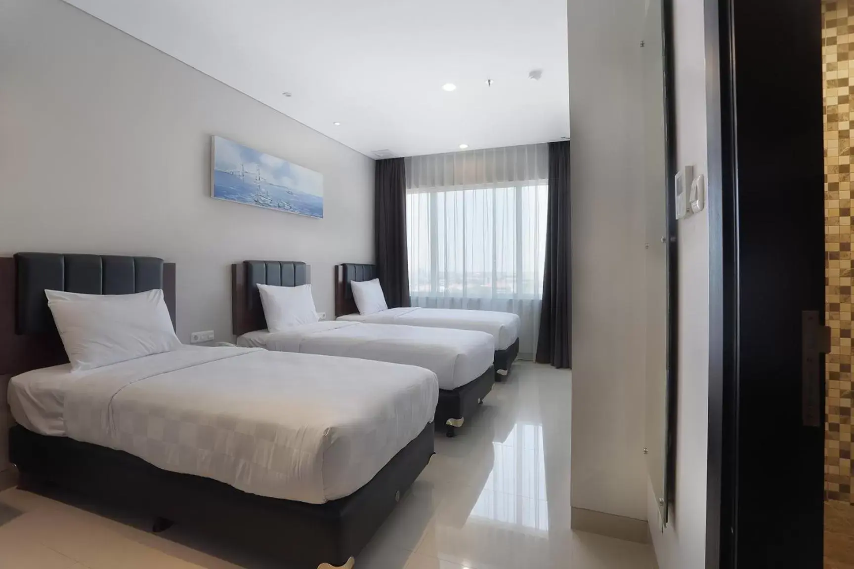 Bedroom, Bed in PrimeBiz Hotel Surabaya