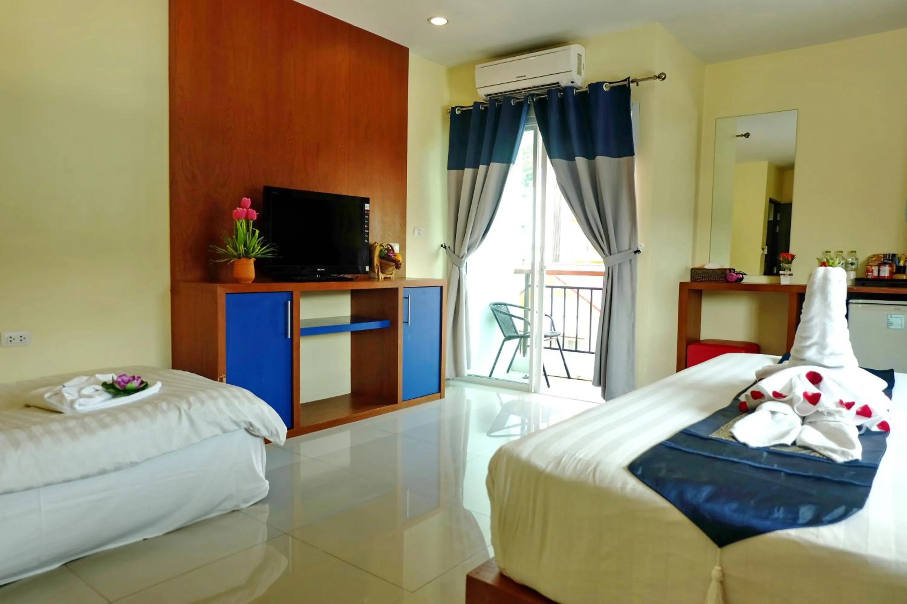 Bed in Calypso Patong Hotel