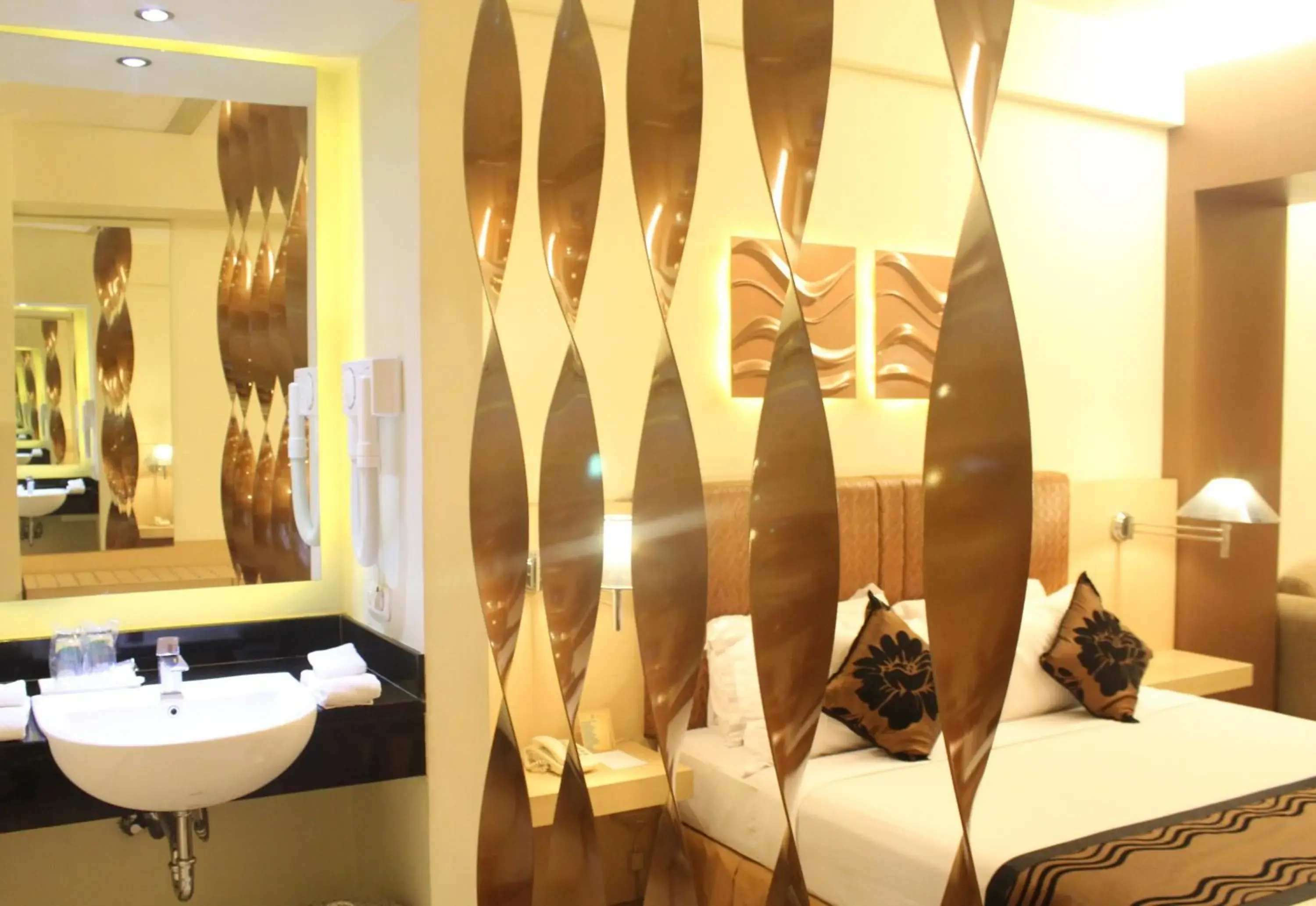 Bedroom, Bathroom in Lux Tychi Hotel Malang