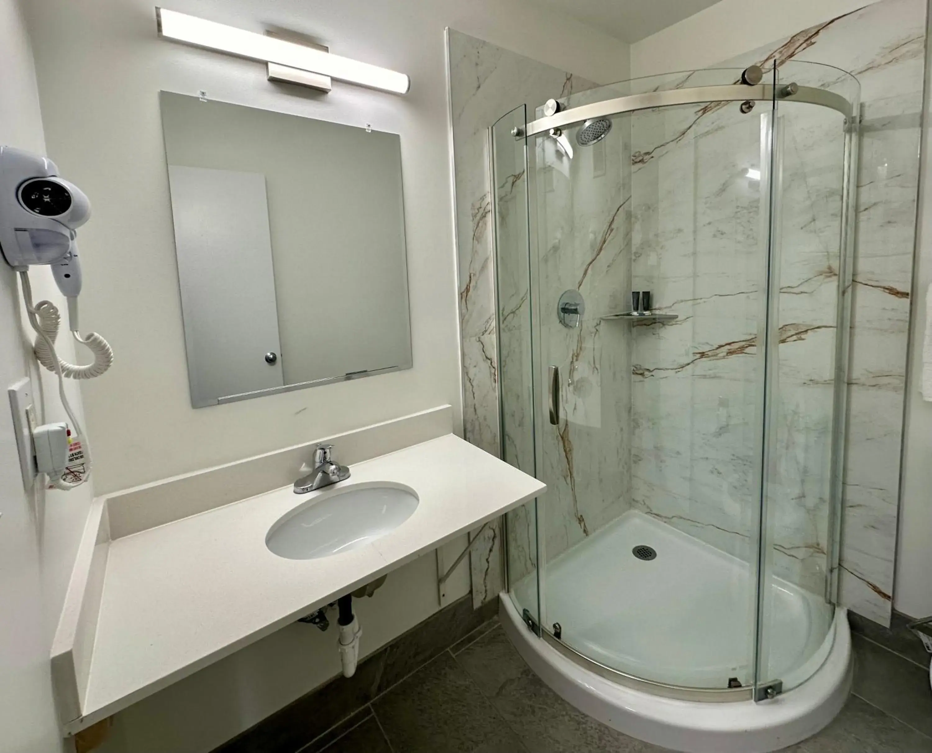 Shower, Bathroom in Royal Inn and Suites Charlotte Airport