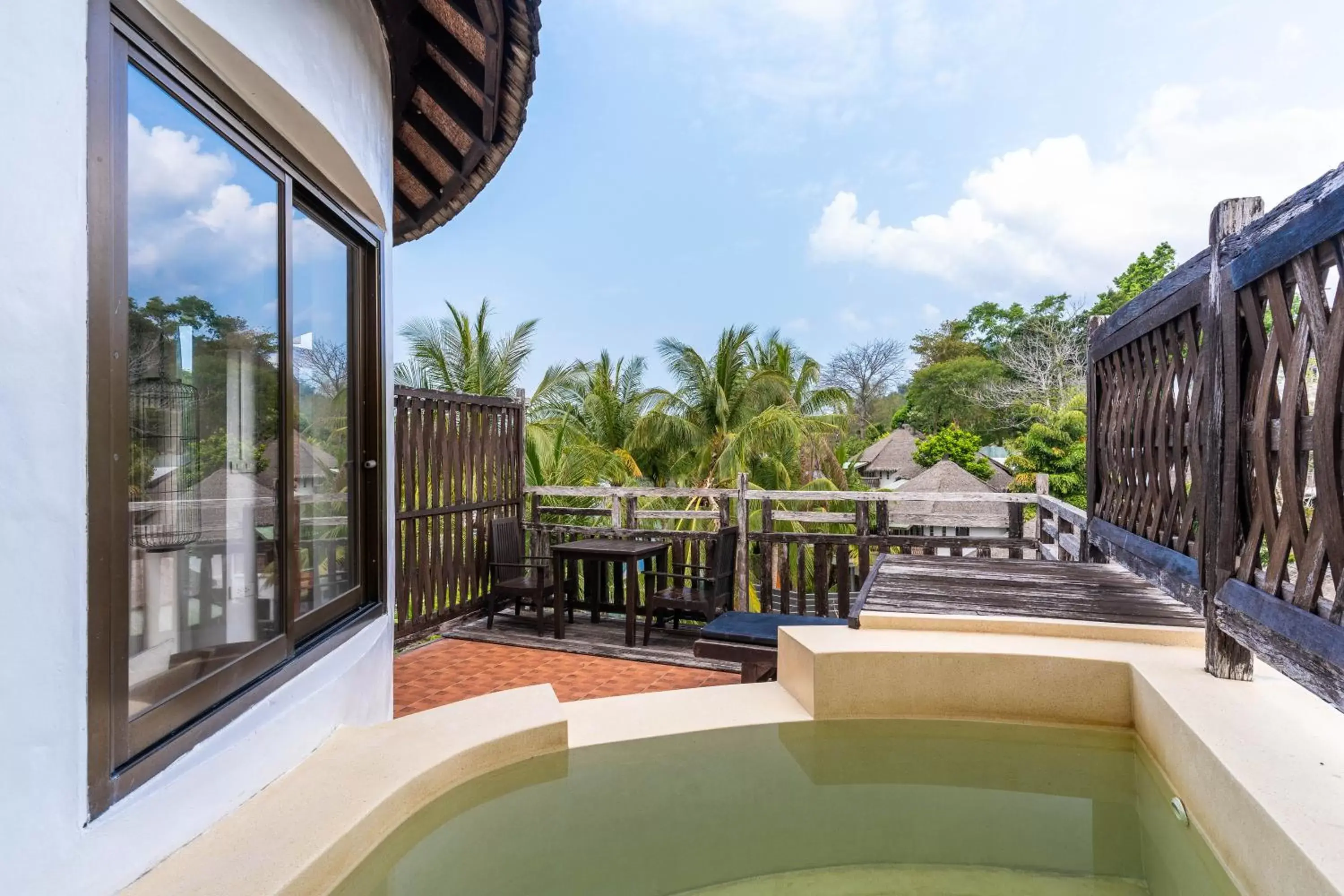 Balcony/Terrace, Swimming Pool in Aana Resort & Spa