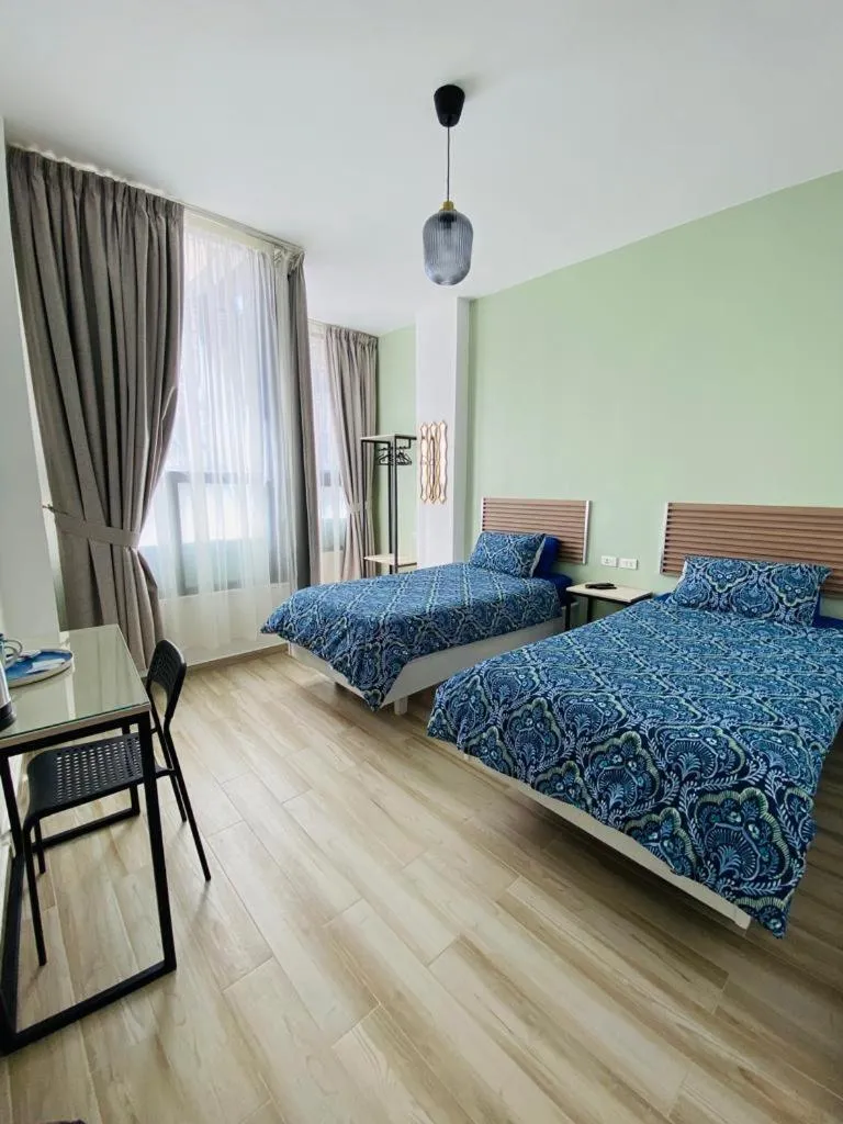 Bed in Arabesque Hotel