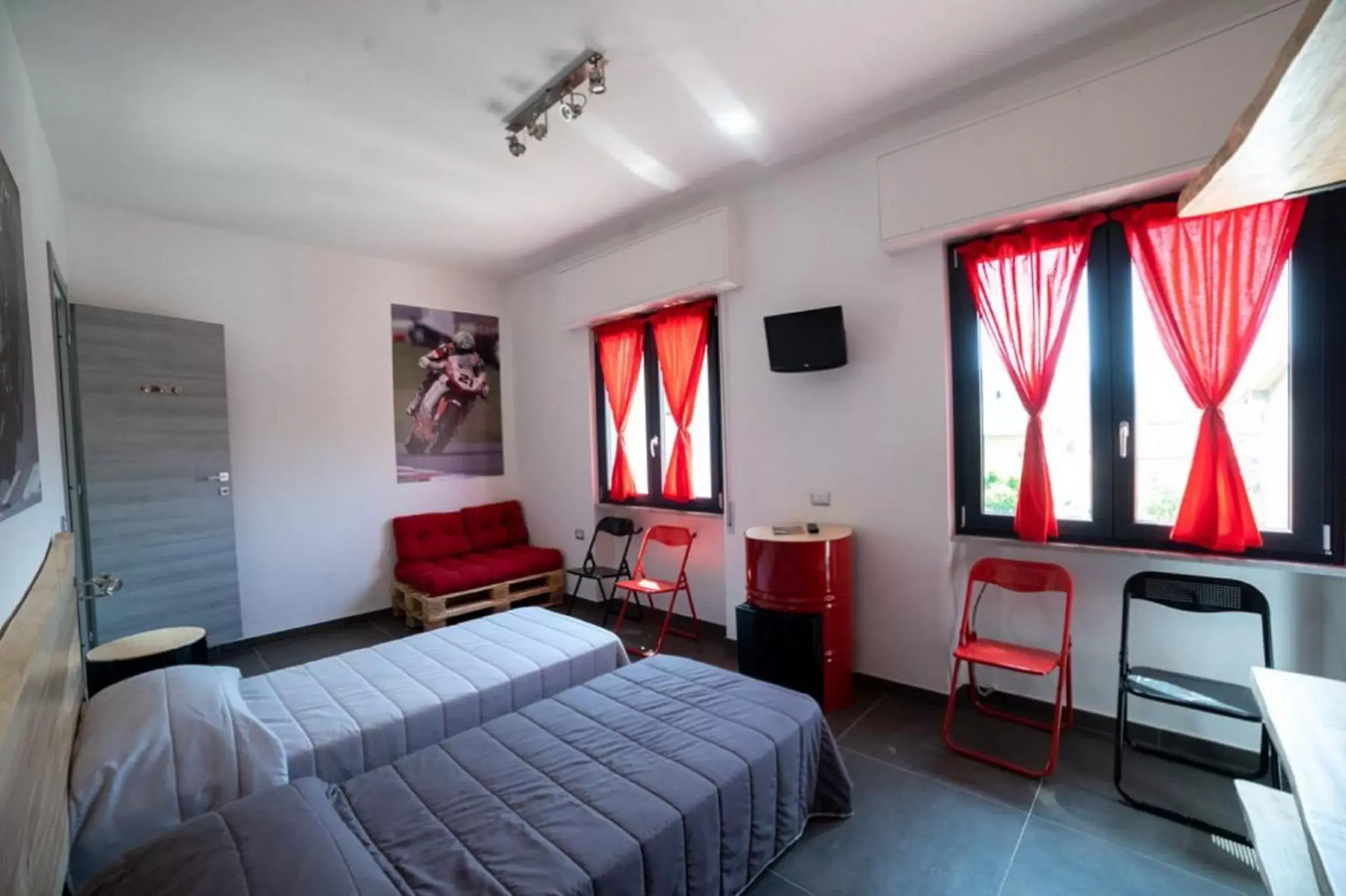 Bedroom in Italian Piston House Sport Moto Rent