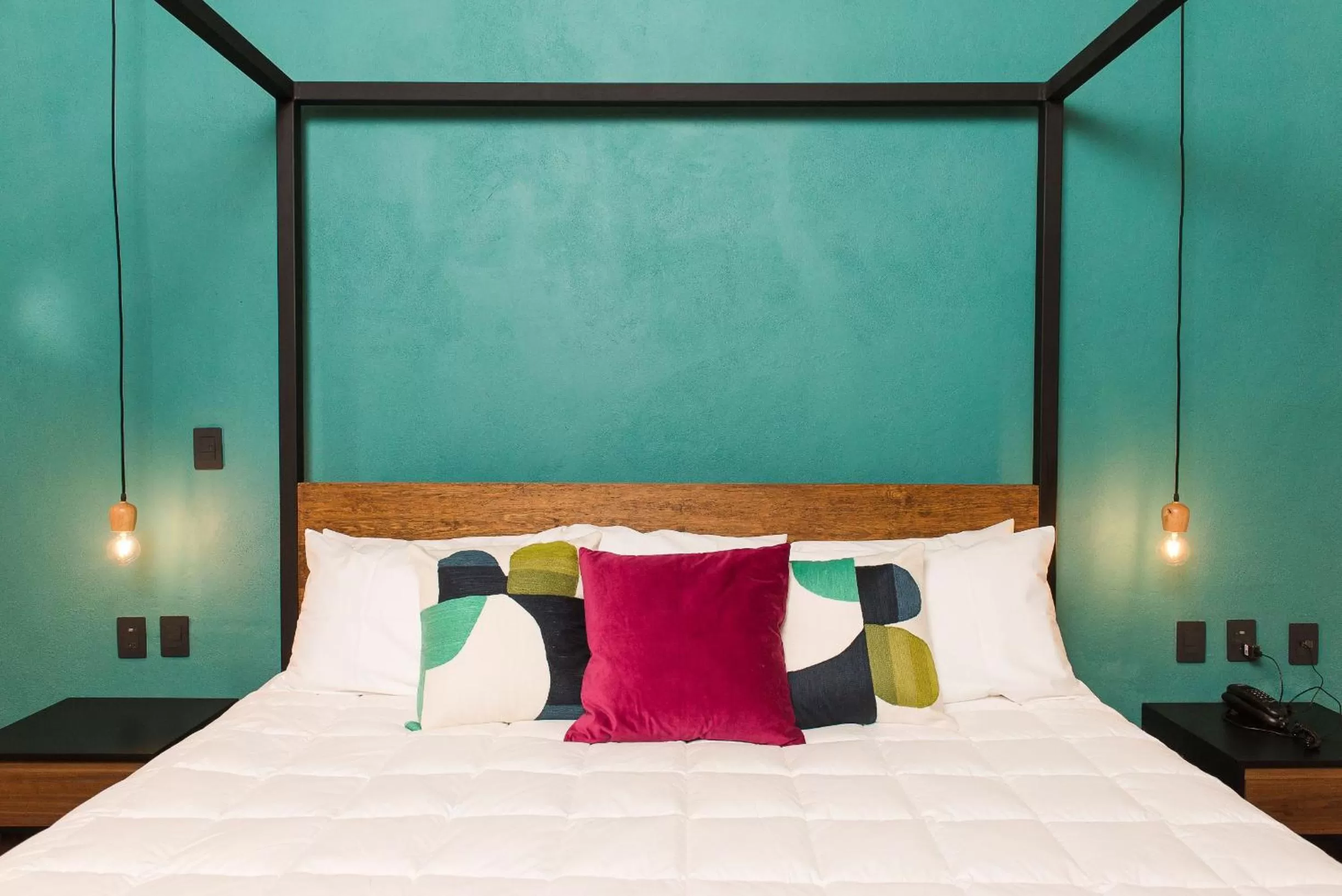 Bed in Antigua Trece Hotel Fusión