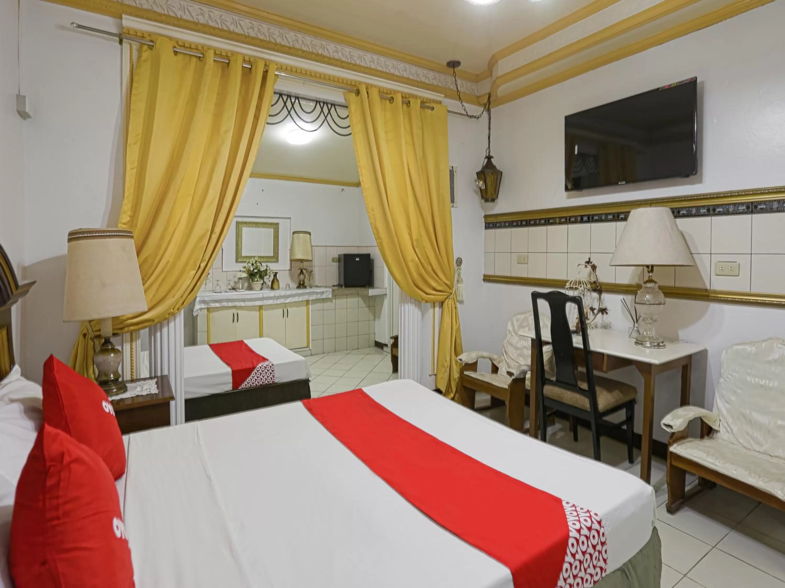 Bedroom in OYO 784 Laura's Garden Resort