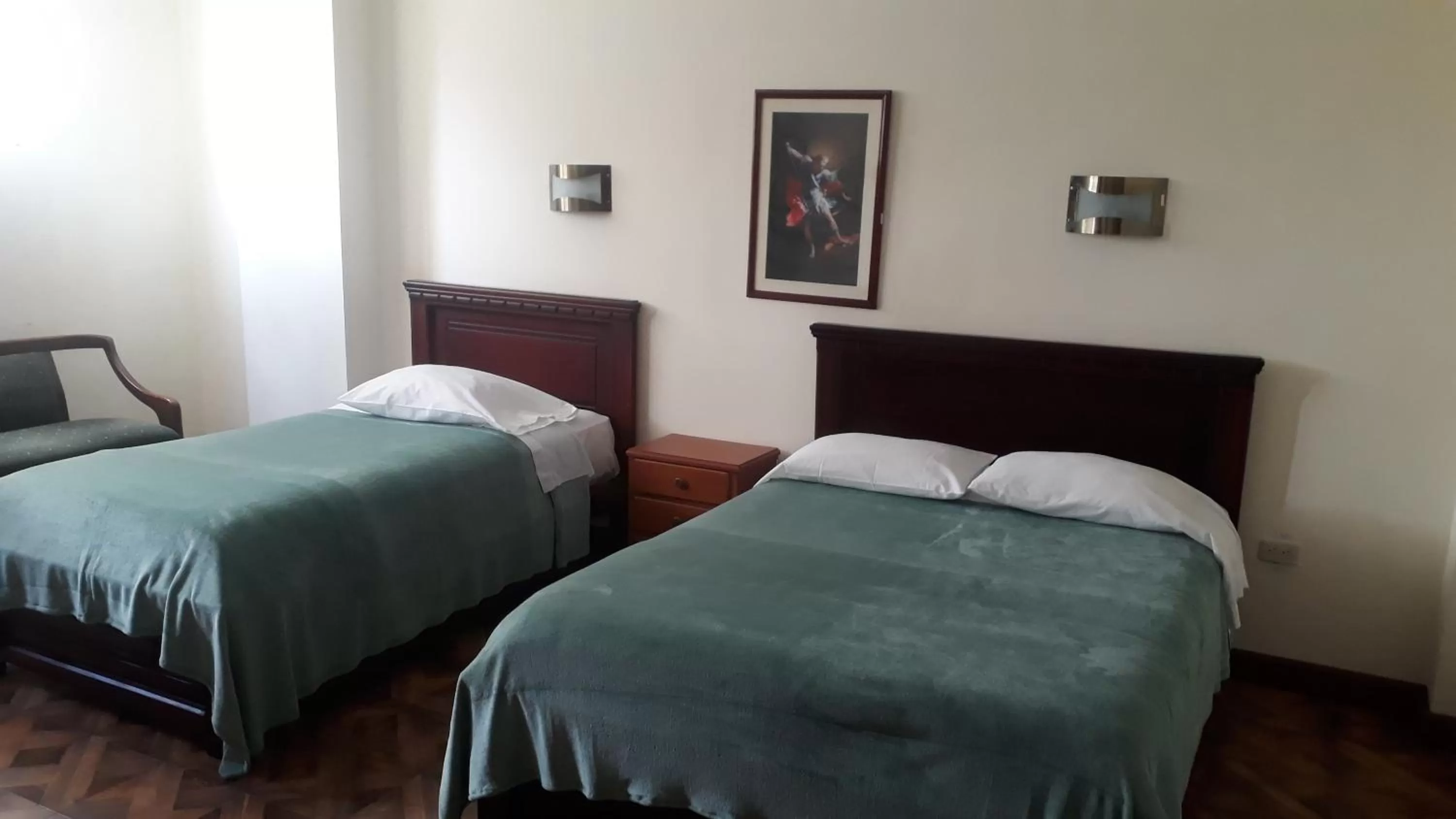 Bed in El Cardenal Hotel