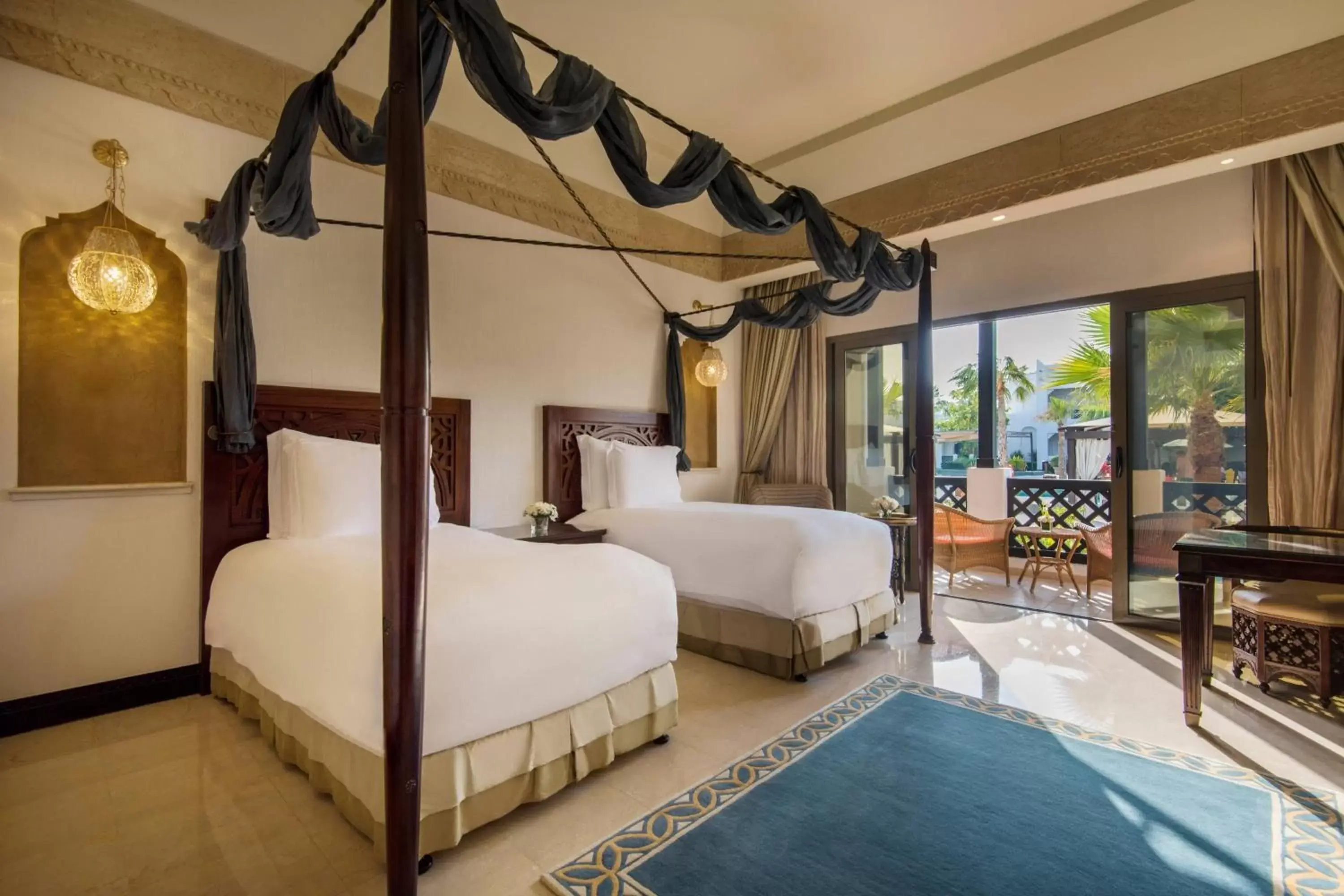 Swimming pool, Bed in Sharq Village & Spa, a Ritz-Carlton Hotel