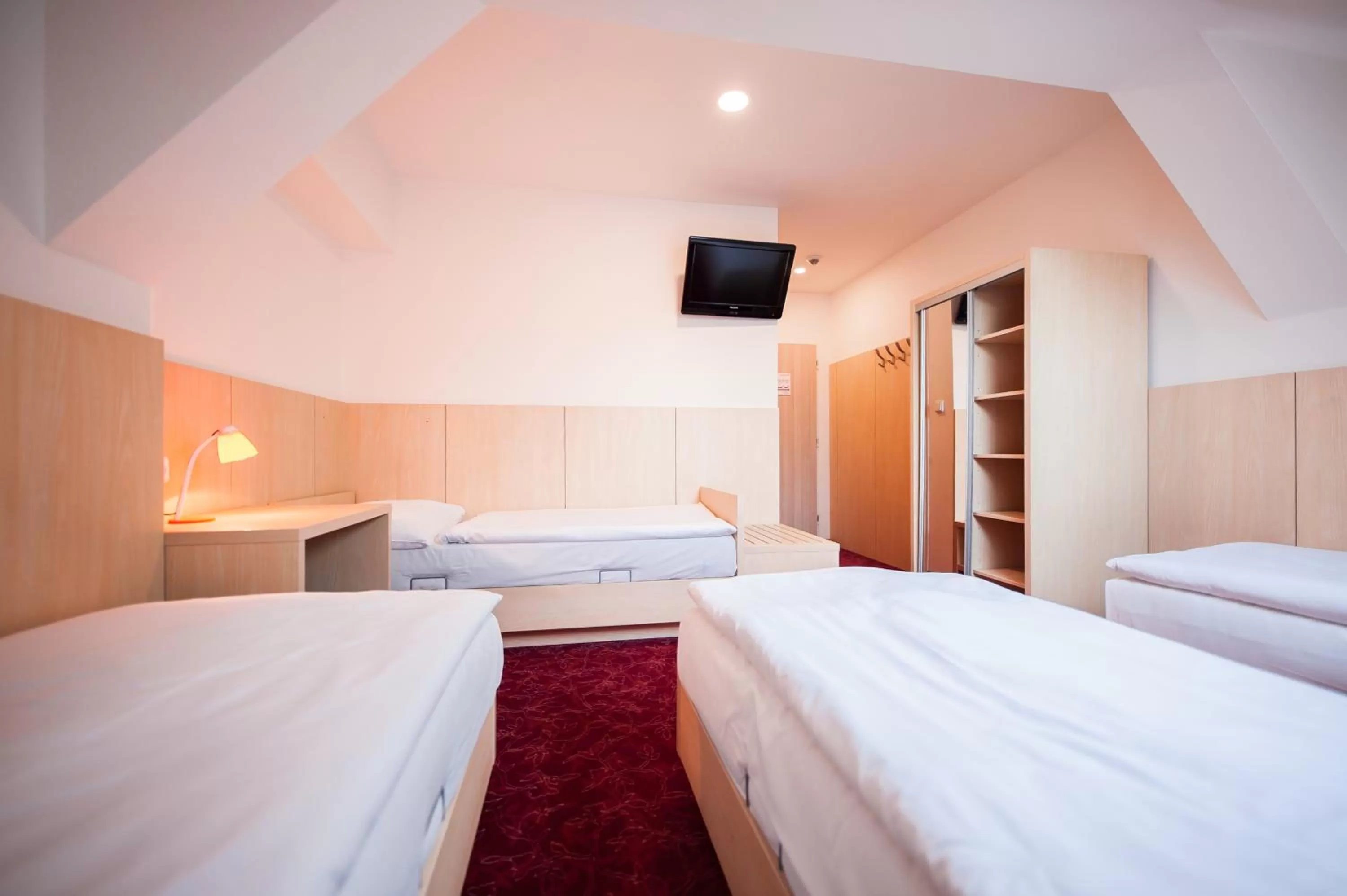 Bed in Hotel Pivovar