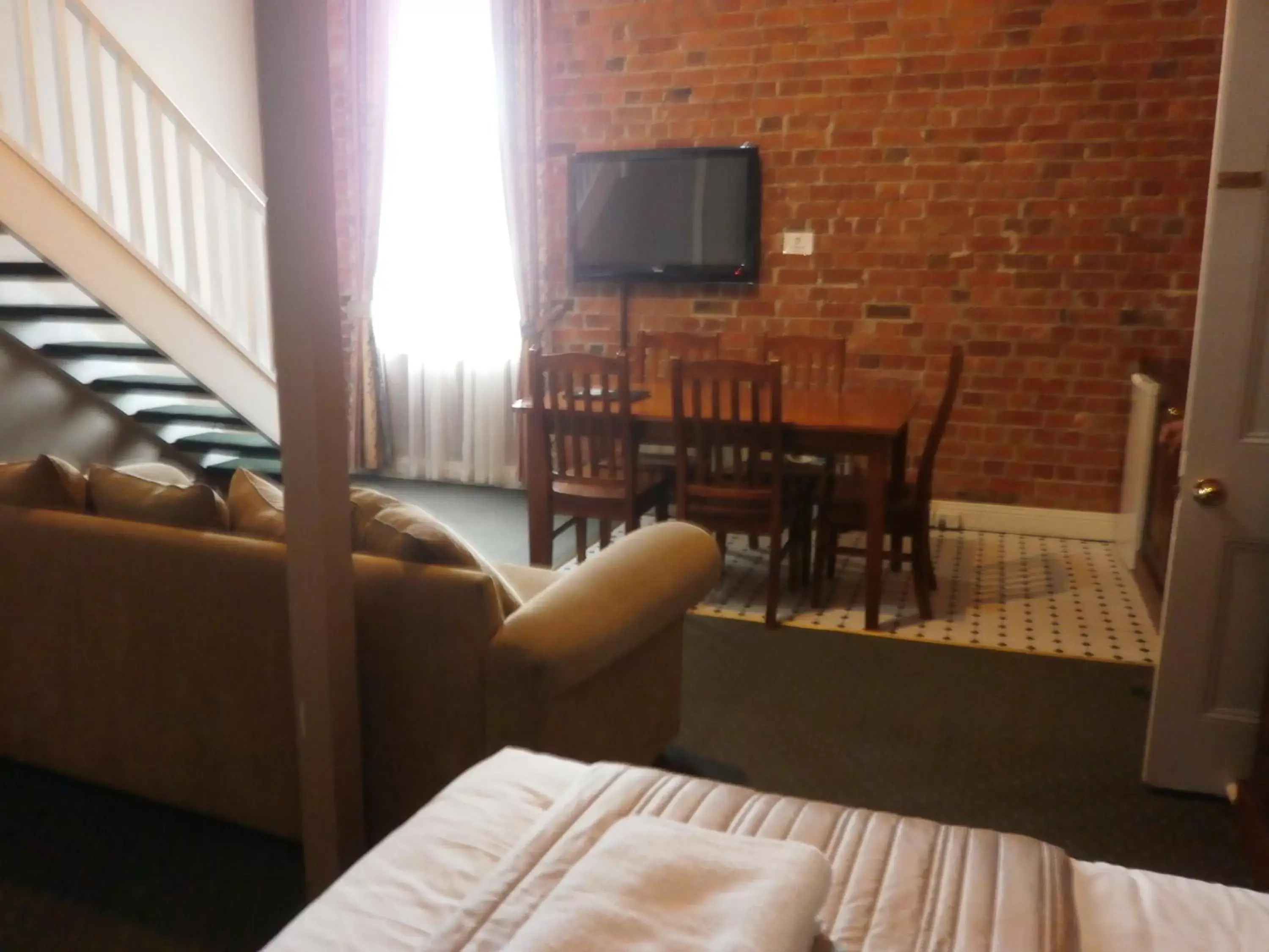 Photo of the whole room, TV/Entertainment Center in Central Springs Inn