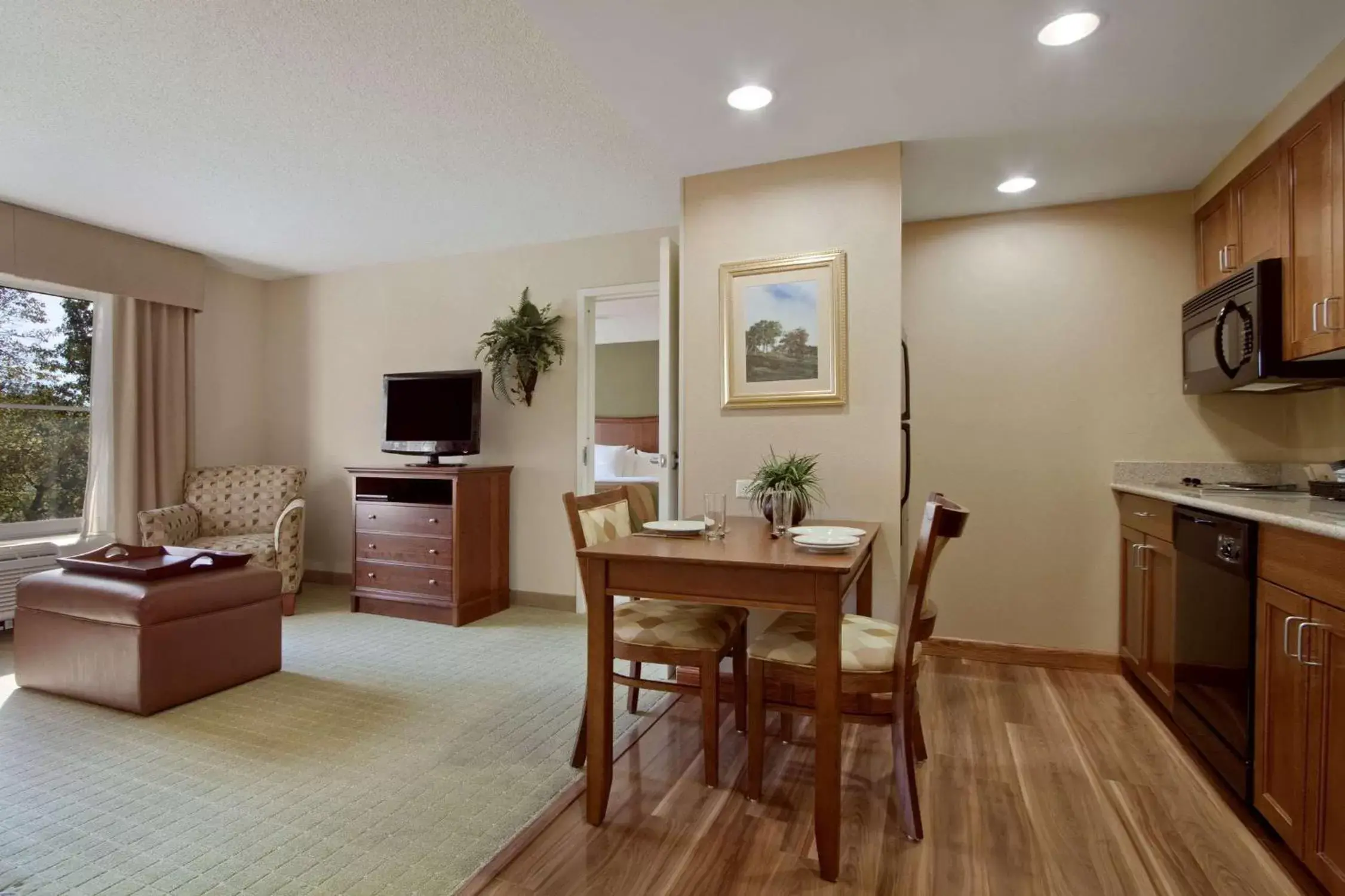 Living room, Dining Area in Homewood Suites by Hilton Rochester - Victor