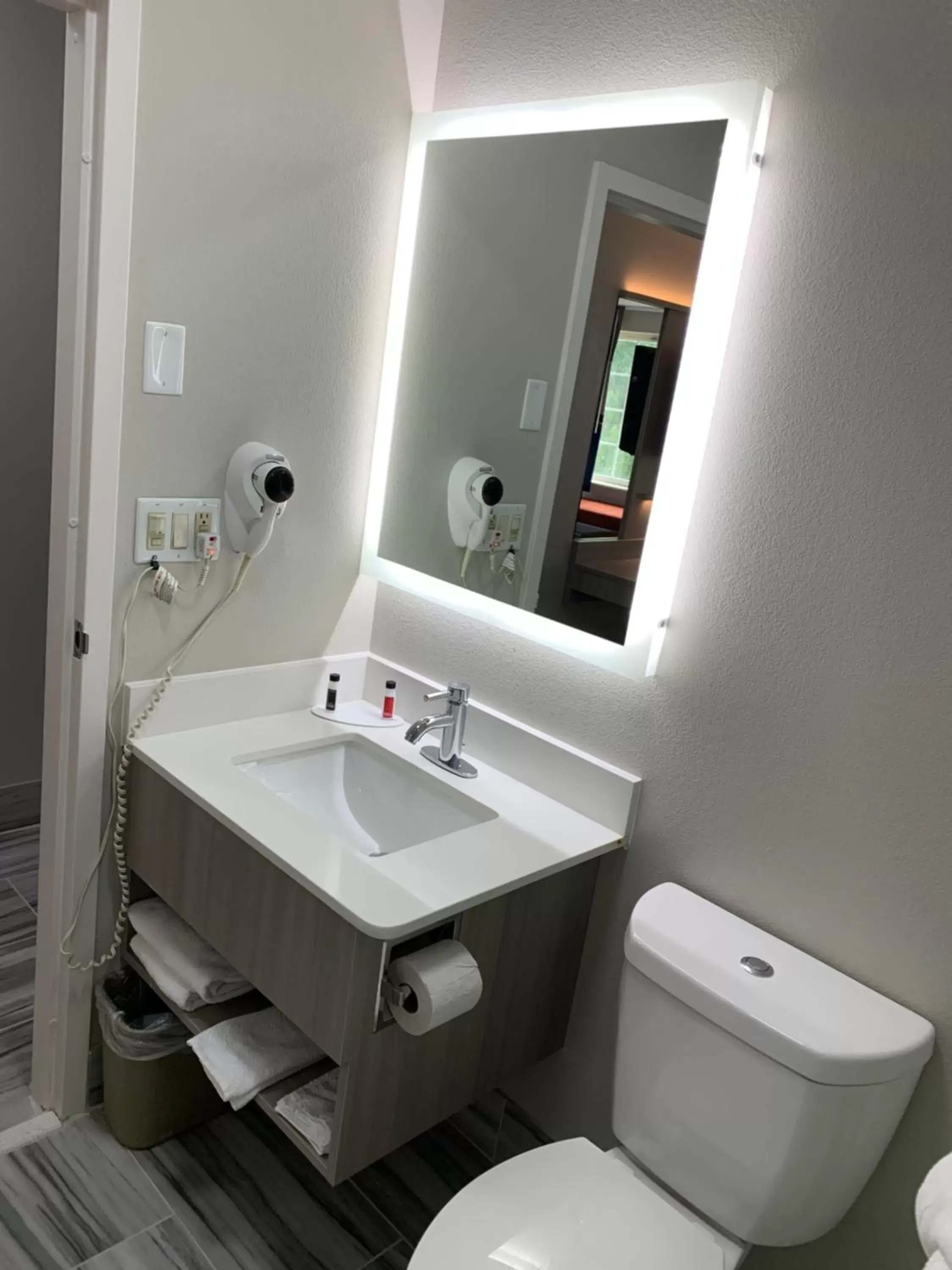 Bathroom in Microtel Inn by Wyndham Charlotte Airport