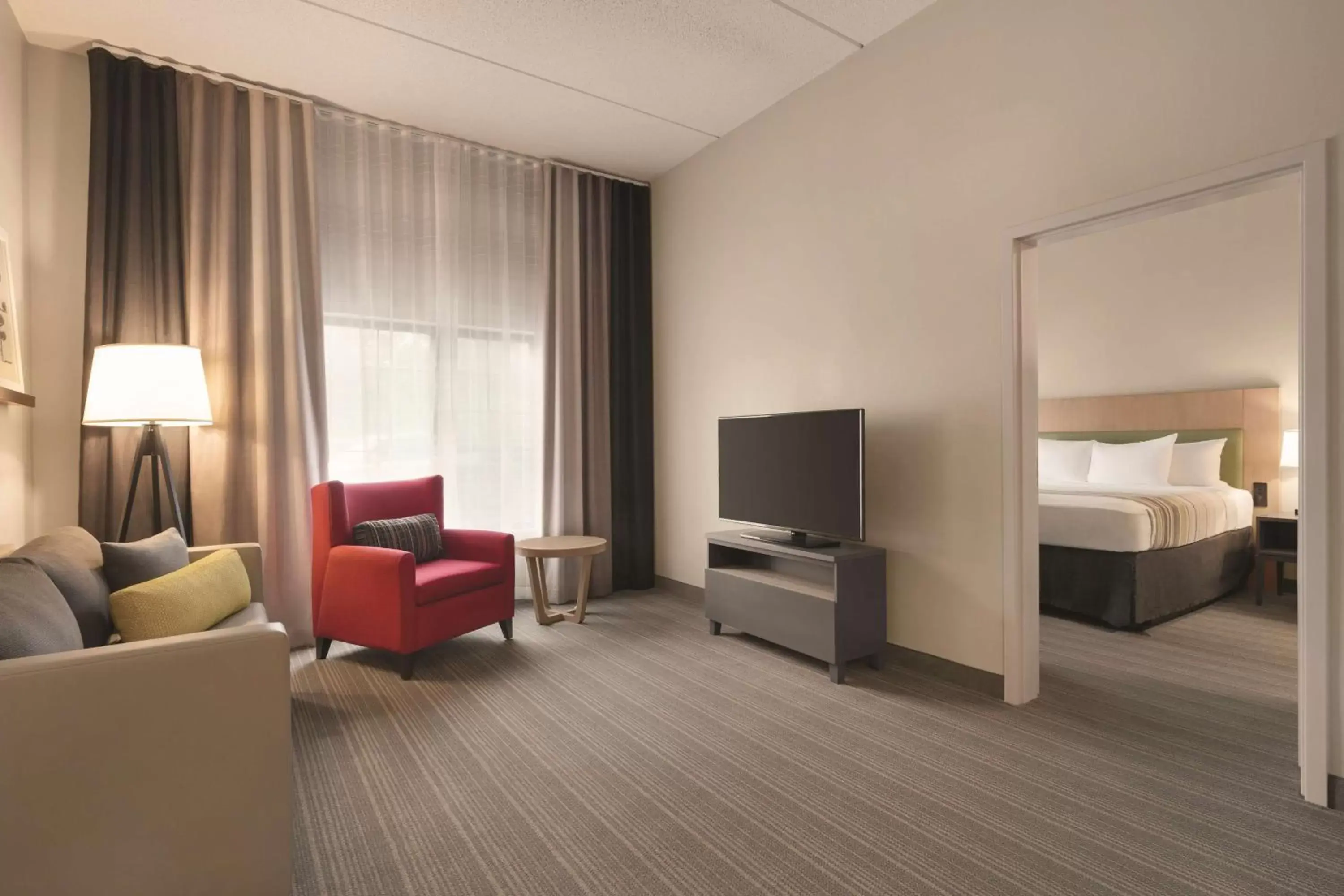 Photo of the whole room, TV/Entertainment Center in Country Inn & Suites by Radisson, Raleigh-Durham Airport, NC