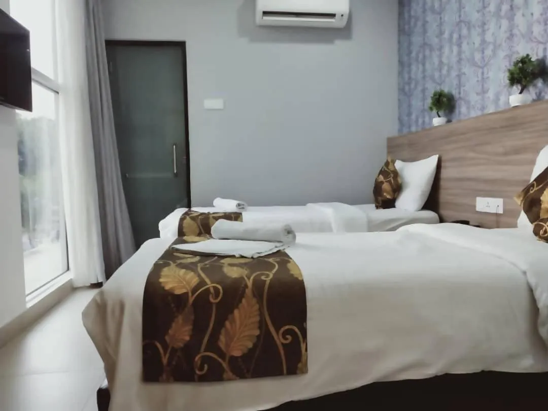 Bed in D'Metro Hotel