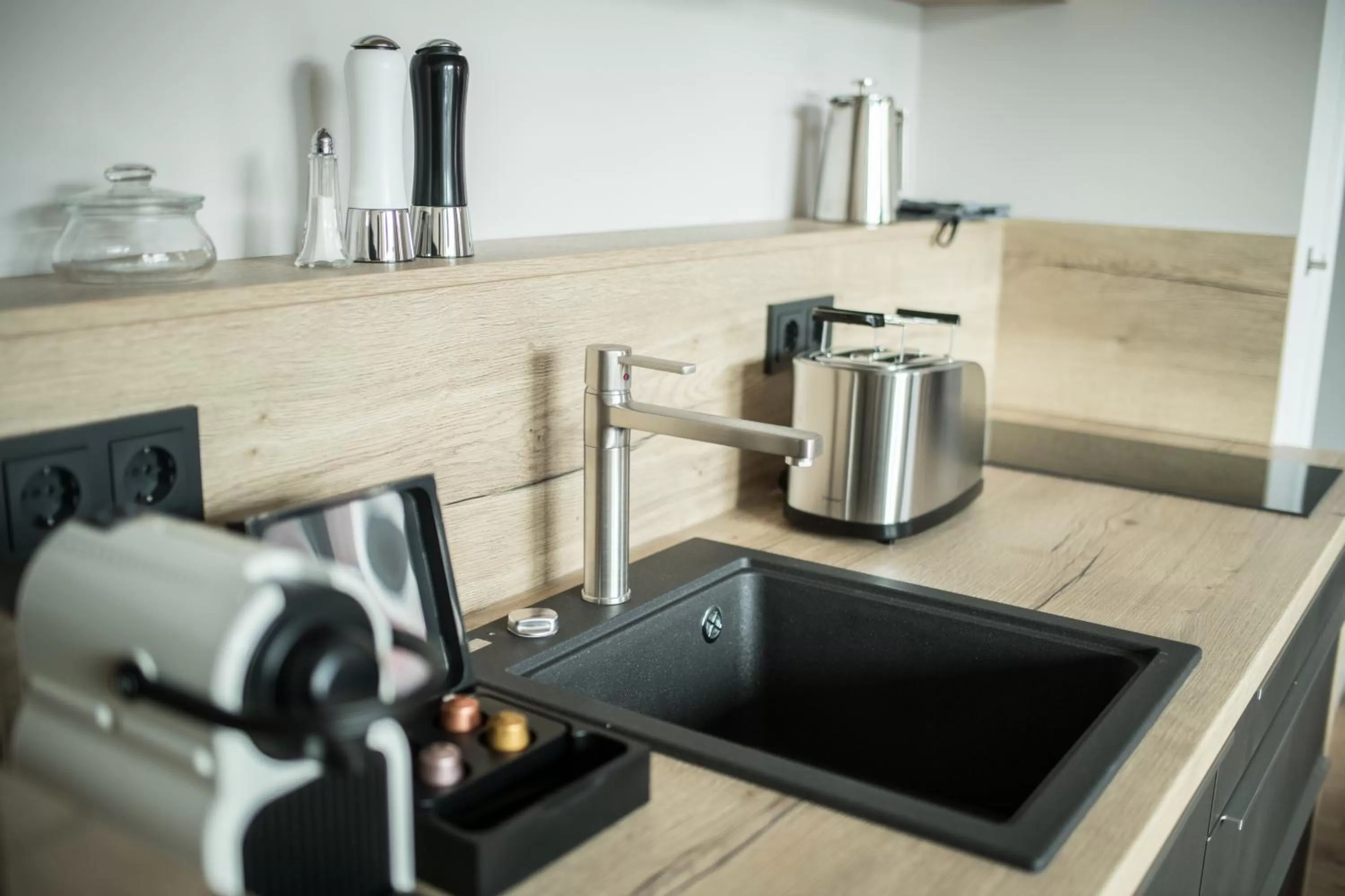 Kitchen or kitchenette in Suites MITTE - Aparthotel