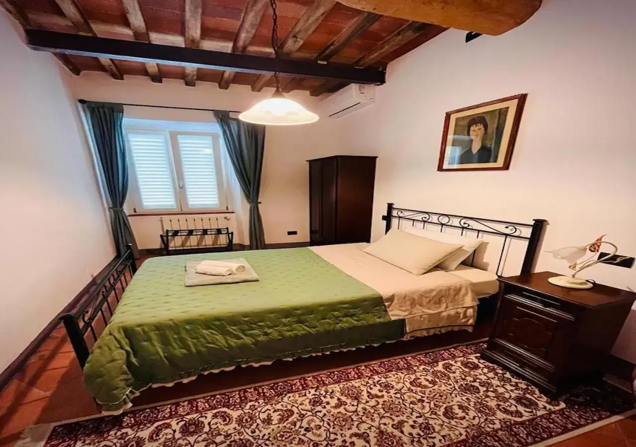 Photo of the whole room, Bed in B&B Giardino delle Camelie