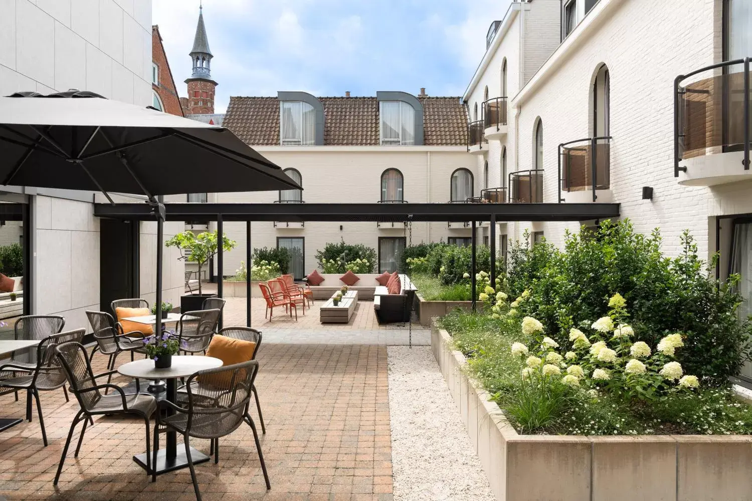 Inner courtyard view in Dukes' Academie Brugge - by Dukes' Hotel Collection Inner courtyard view in Dukes' Academie Brugge - by Dukes' Hotel Collection
