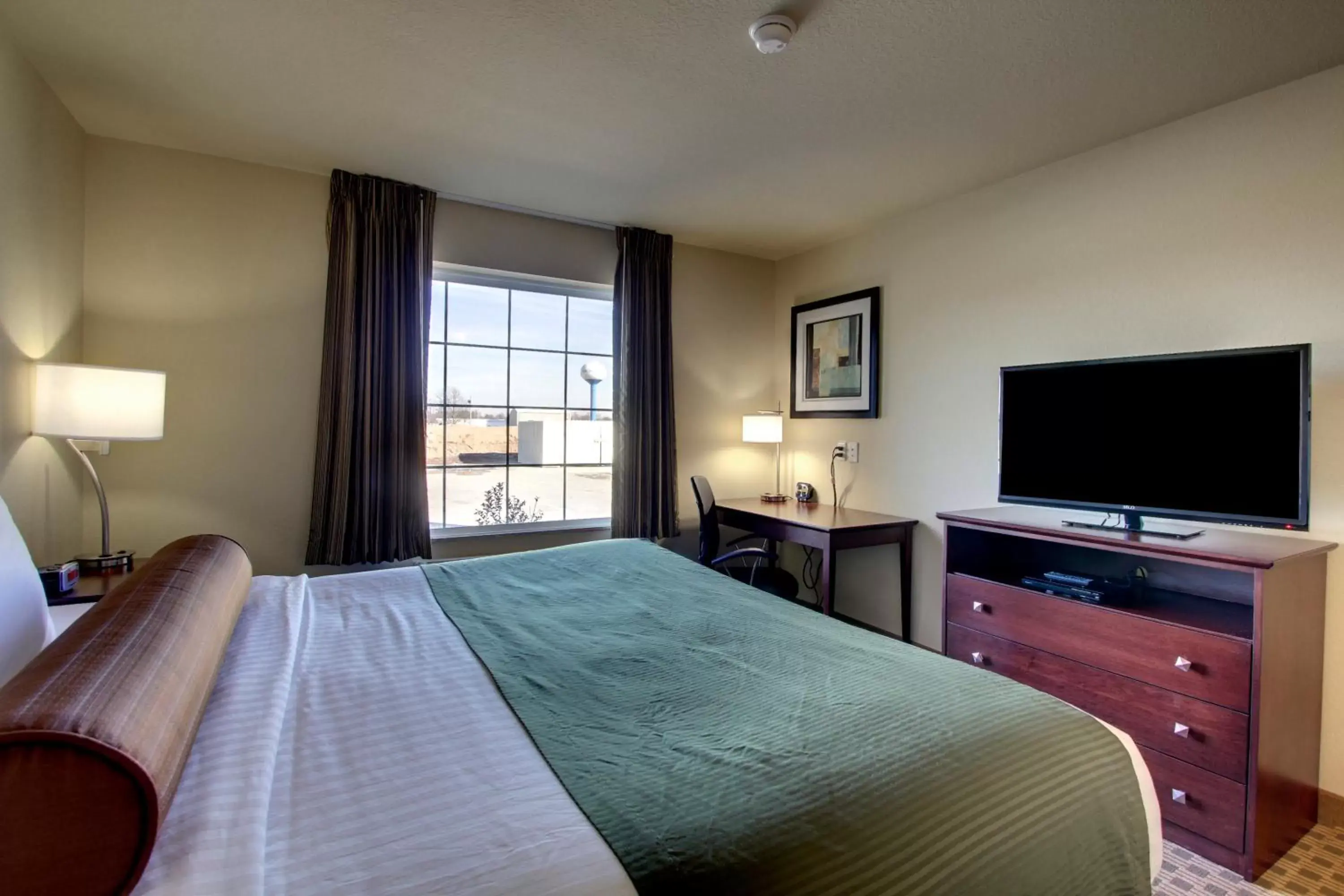 Bed in Cobblestone Hotel & Suites - Newton