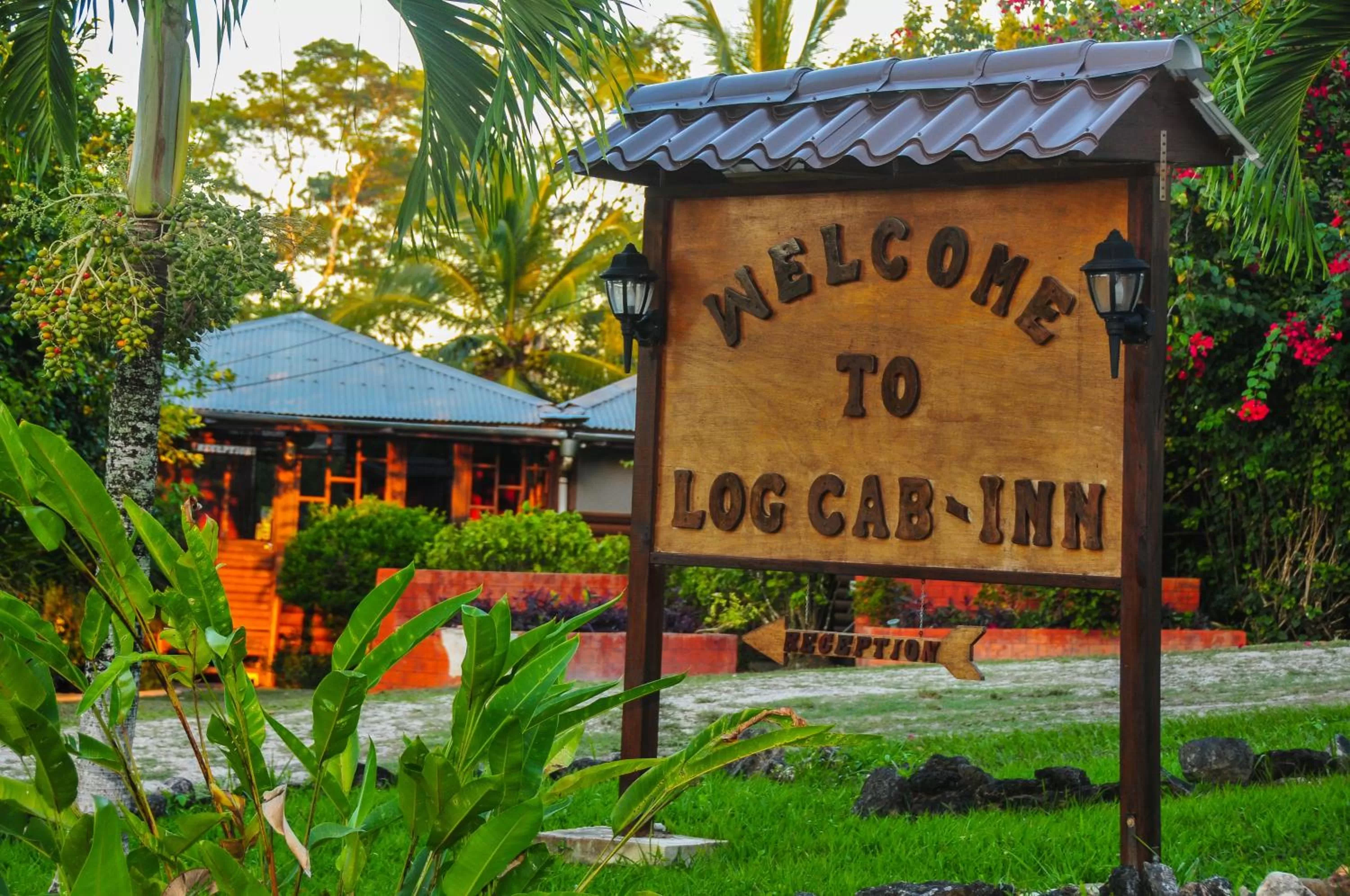 Property logo or sign in The Log Cab-Inn